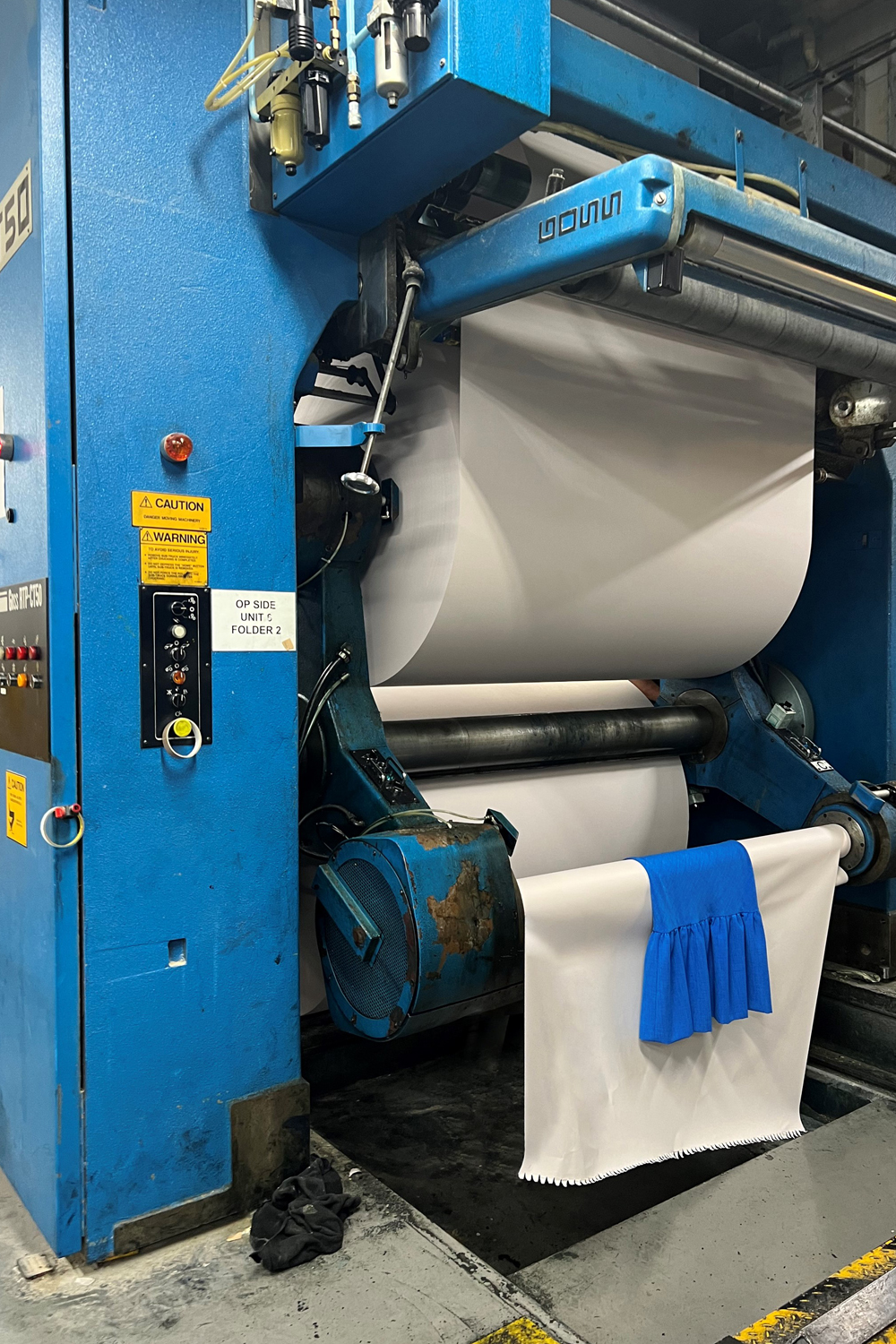 A Liam Patterns dress makes a visit to the printing press in Ellerslie, Auckland. Photo / Supplied. 