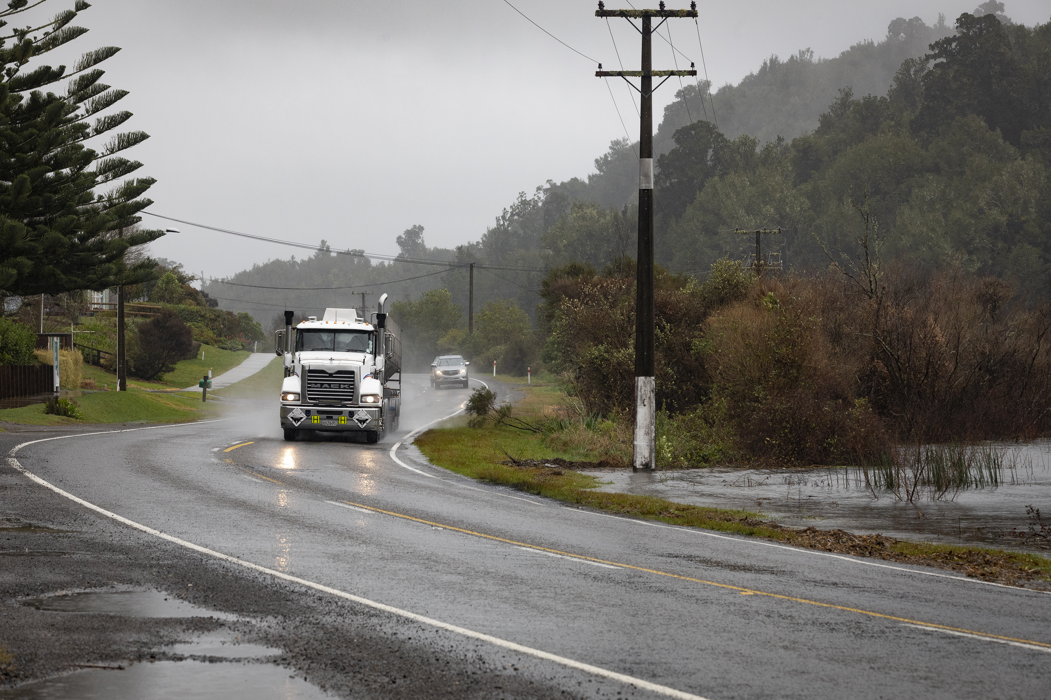 Lake water is nearly at the roadside on State Highway 30. Photo / Andrew Warner