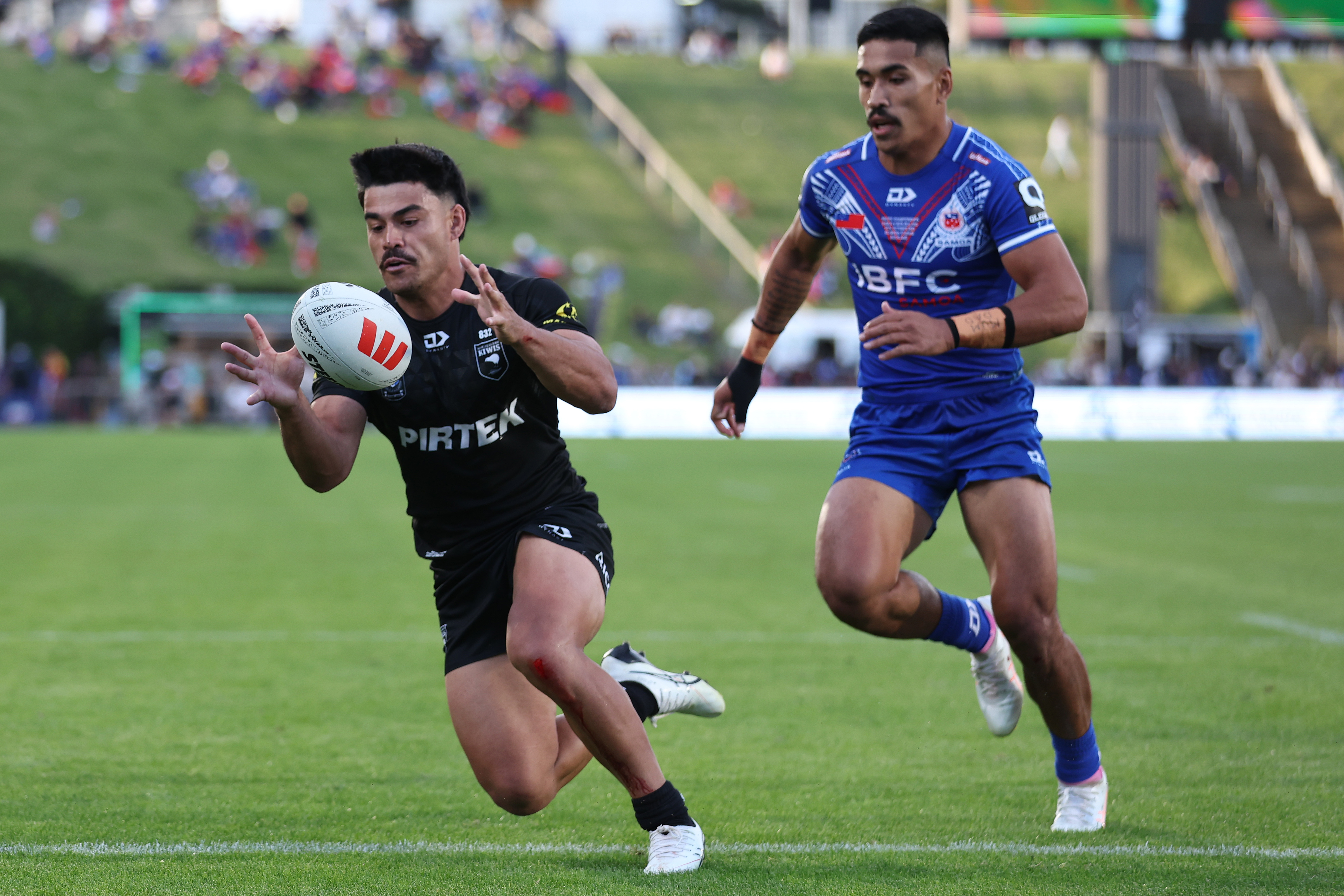 Matthew Timoko scores a crucial try on the stroke of halftime for the Kiwis. Photo / Photosport.