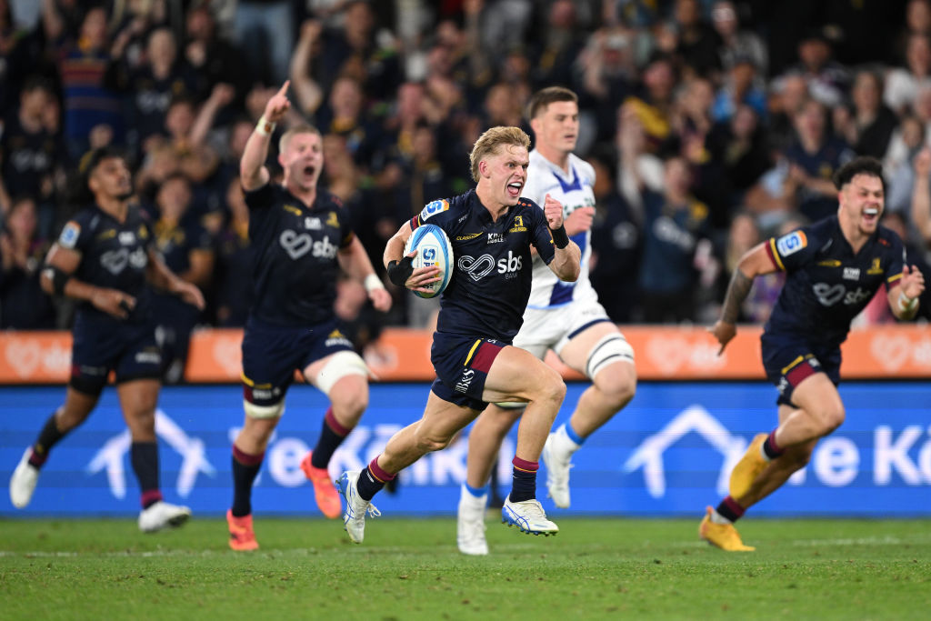 Finn Hurley of the Highlanders makes a break against the Blues. Photo / Getty Images
