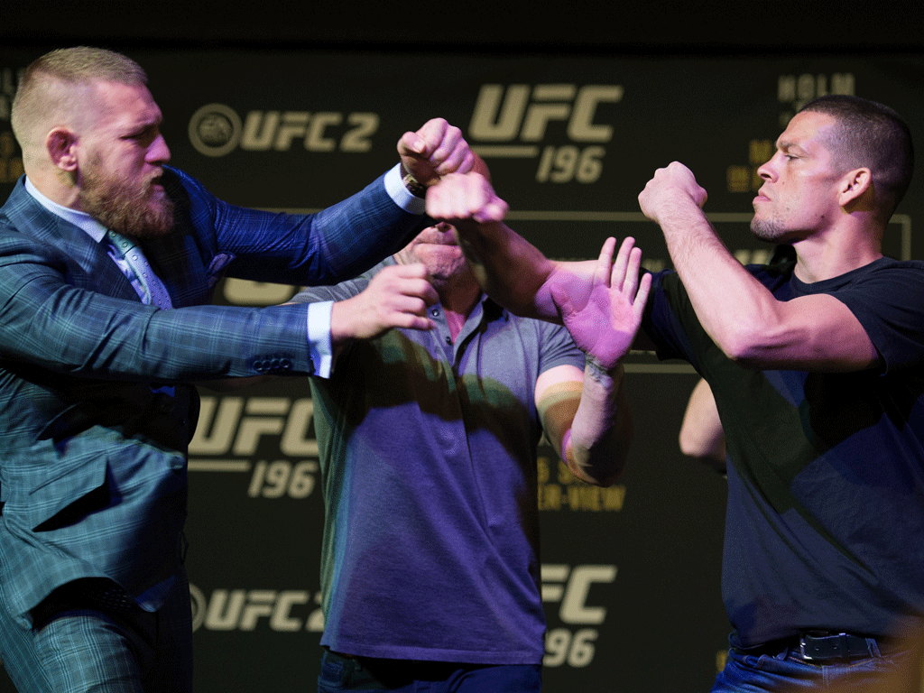 Conor McGregor and Nate Diaz almost come to blows during heated face-off  ahead of UFC 196 clash - NZ Herald