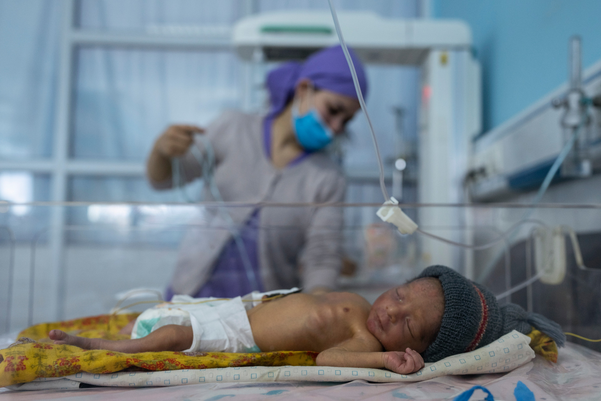 A nurse takes care of a baby in the neonatal intensive care unit of Malalai Maternity hospital in Kabul. Photo / AP