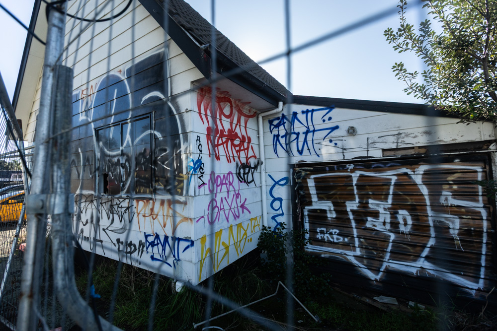 Derelict buildings in front of and around the  New World Pt Chevalier which is planned to open in August. Photo / Jason Dorday