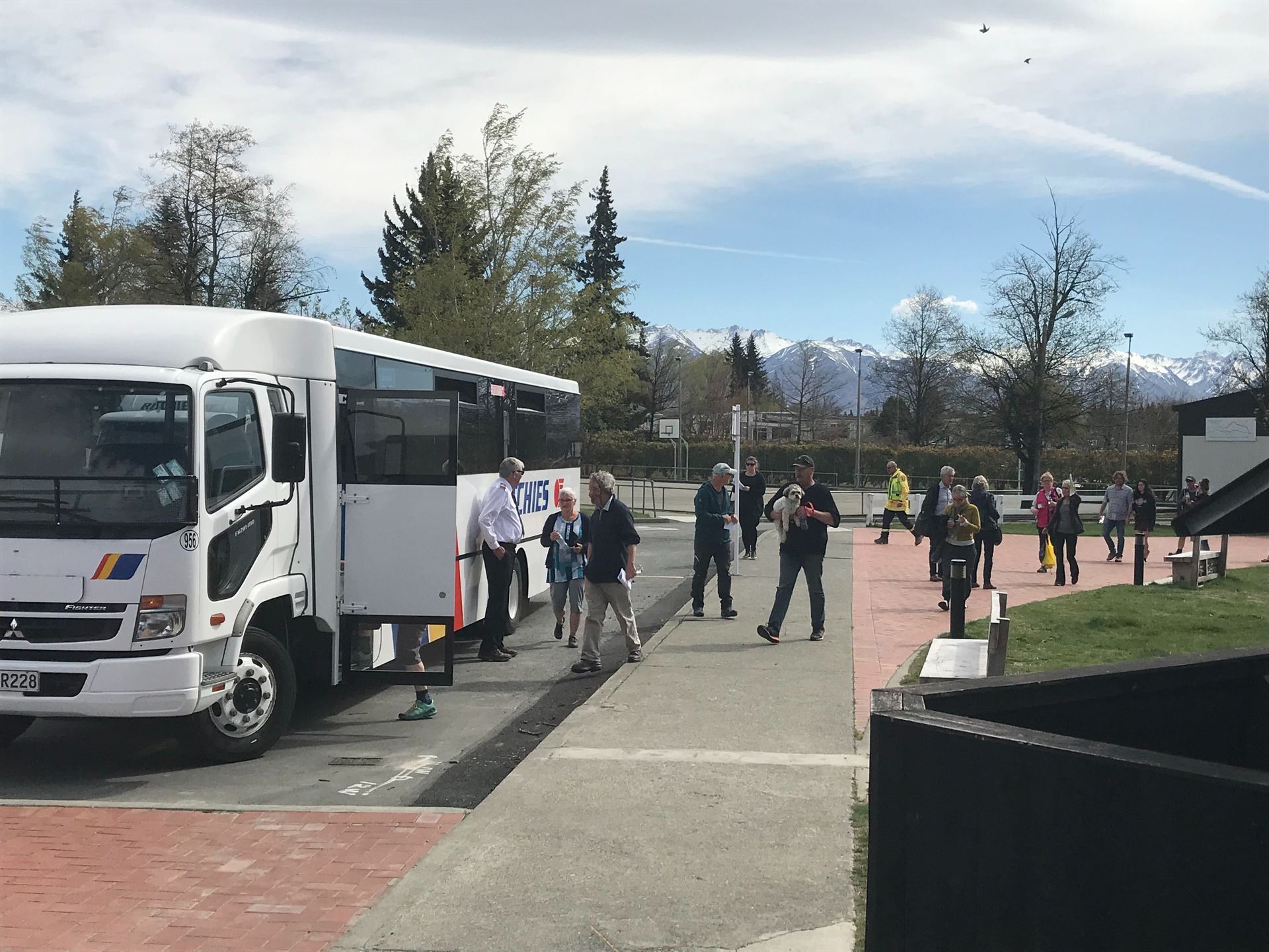 Lake Ōhau residents board a bus to tour the fire-ravaged area on Monday afternoon. Photo / Logan Church
