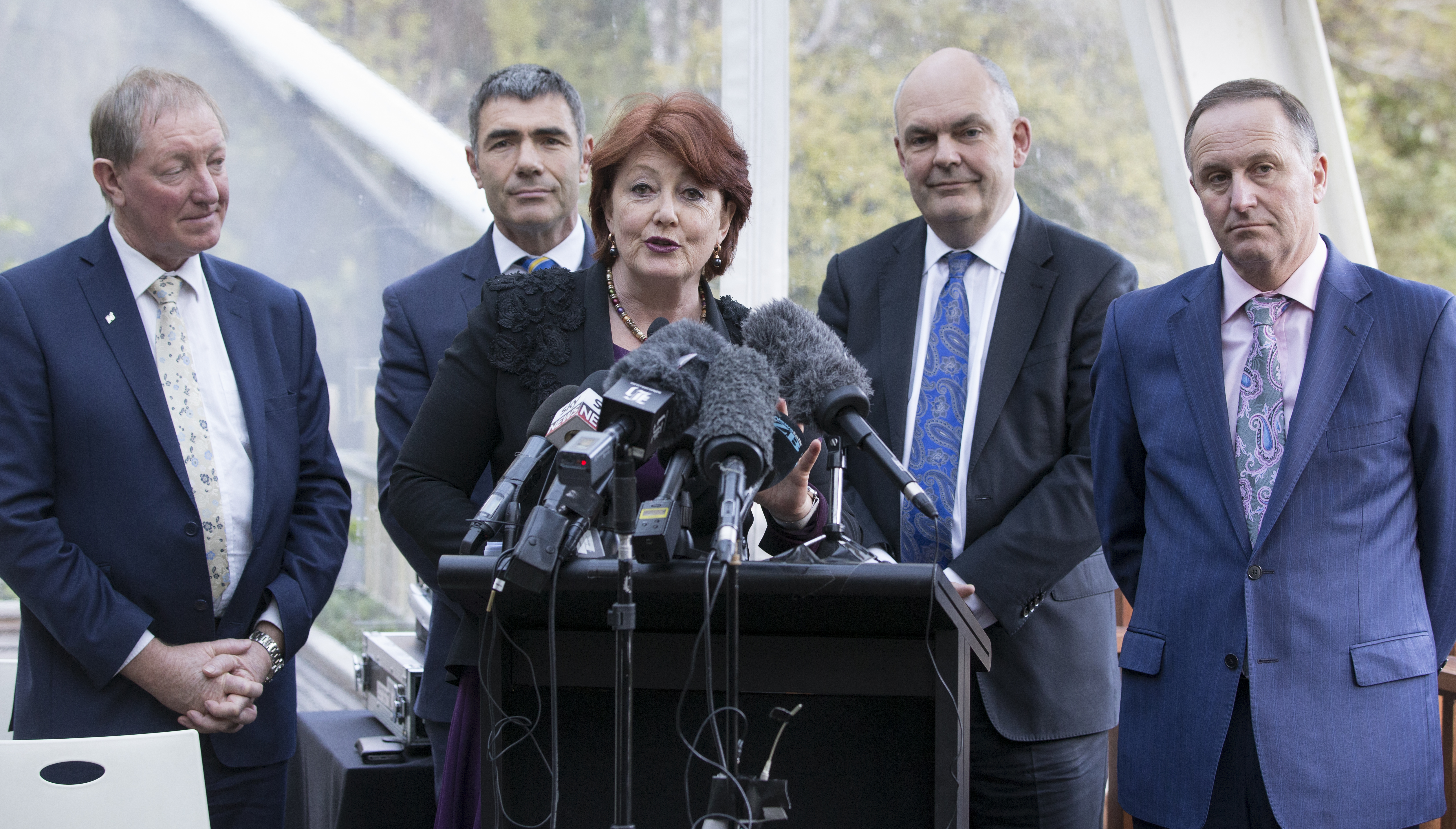 Conservation Minister Maggie Barry, flanked by Ministers Nick Smith, Nathan Guy, Steven Joyce, and Prime Minister John Key. Photo / Mark Mitchell