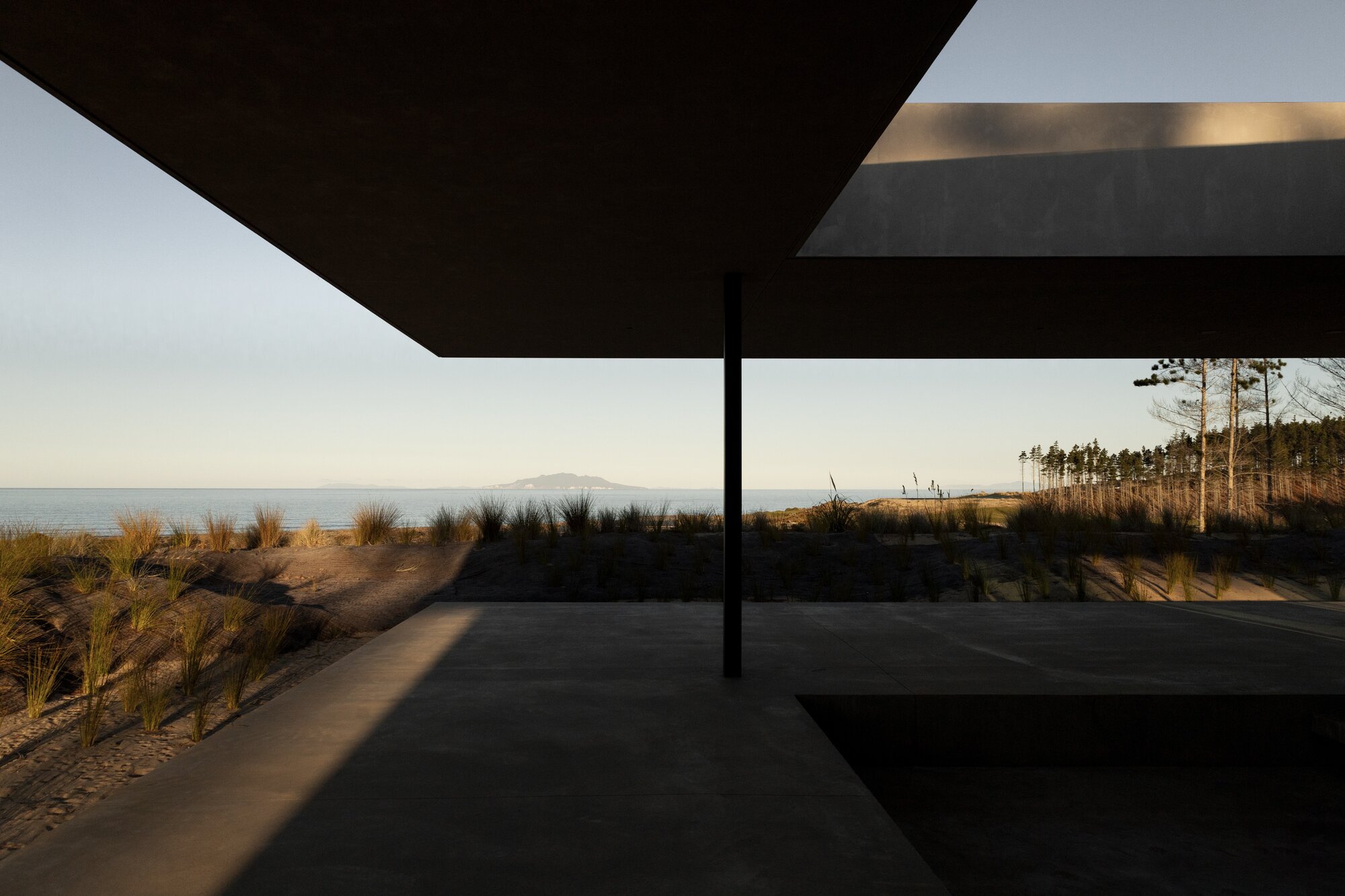 Picturesque views framed by the home at Te Arai, north of Auckland. Photo / Monk Mackenzie