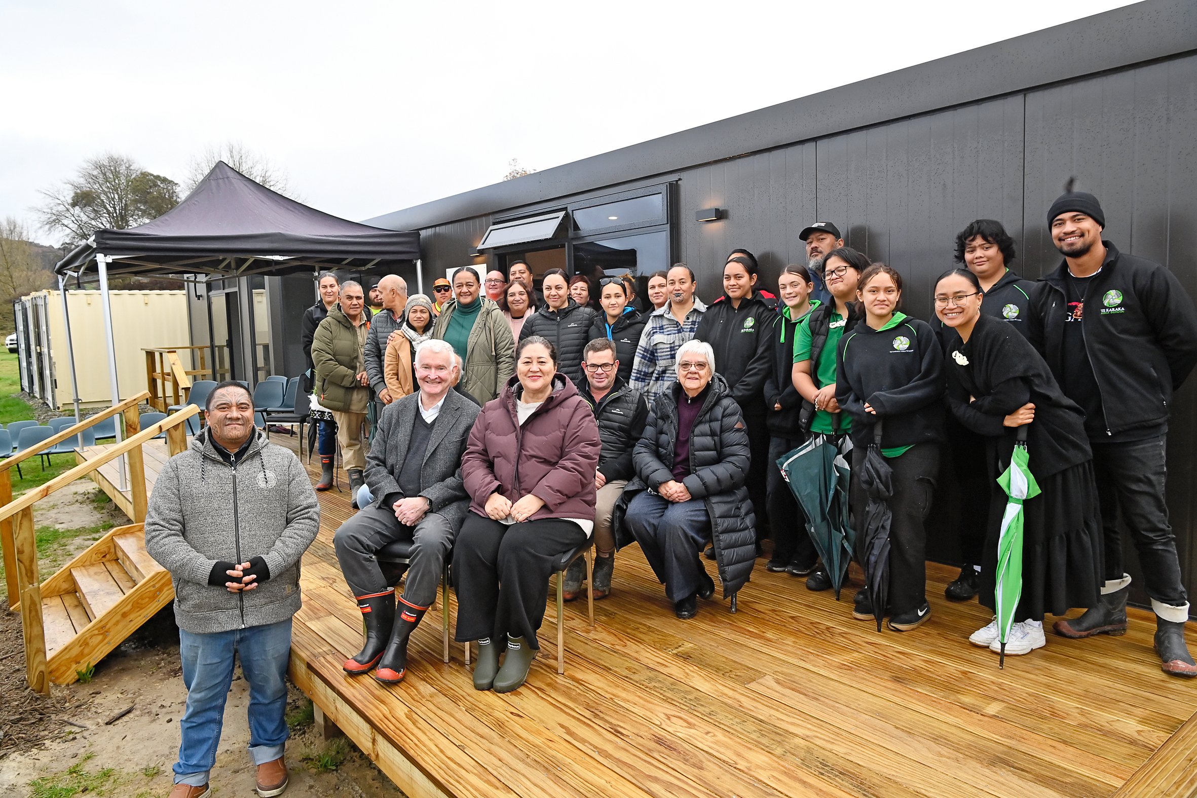 Morehu Pewhairangi (left), Richard Davies (Dame Cindy Kiro's husband), Governor-General Dame Cindy Kiro, Tim Rhodes, Romia Whaanga, students from Te Karaka Area School and others from the Te Karaka community at the Mahaki Tiaki Tangata opening. Photo / Paul Rickard