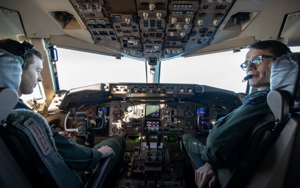 Defence force pilots on the NZDF 757. Photo / RNZ / Nate McKinnon