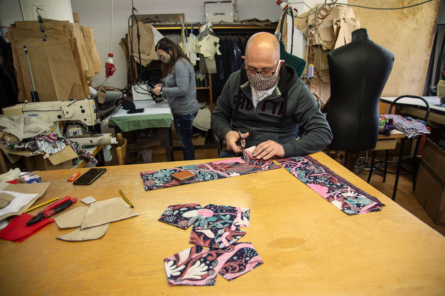 A tailor at work in a tailoring that produces reusable masks during the Covid-19 emergency in Pontecagnano Faiano, Italy. Photo / Getty Images