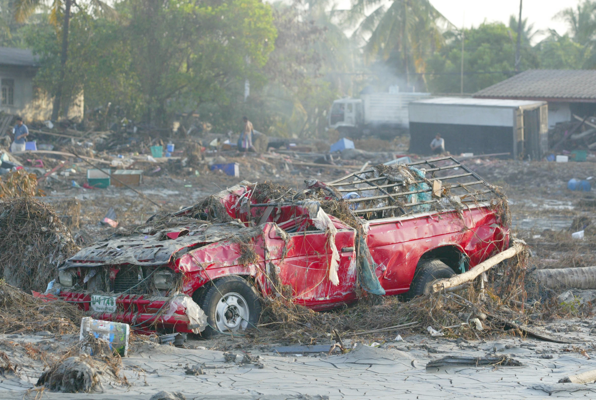 A car sits amid devastation wrought on Phuket, Thailand, by the 2004 Boxing Day earthquake and tsunami. Photo / Brett Phibbs