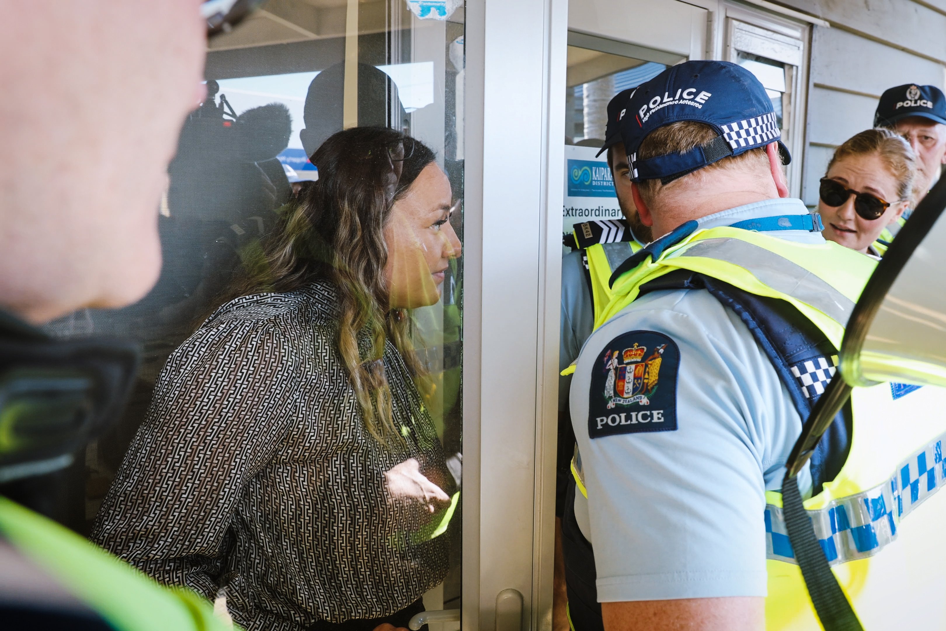 Kaipara Councillor Pera Paniora speaks with Police. Photo / Michael Craig�