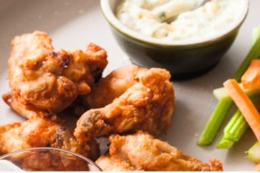 Buffalo Chicken Nibbles With Blue Cheese Aioli And Spicy Dipping Sauce Nz Herald