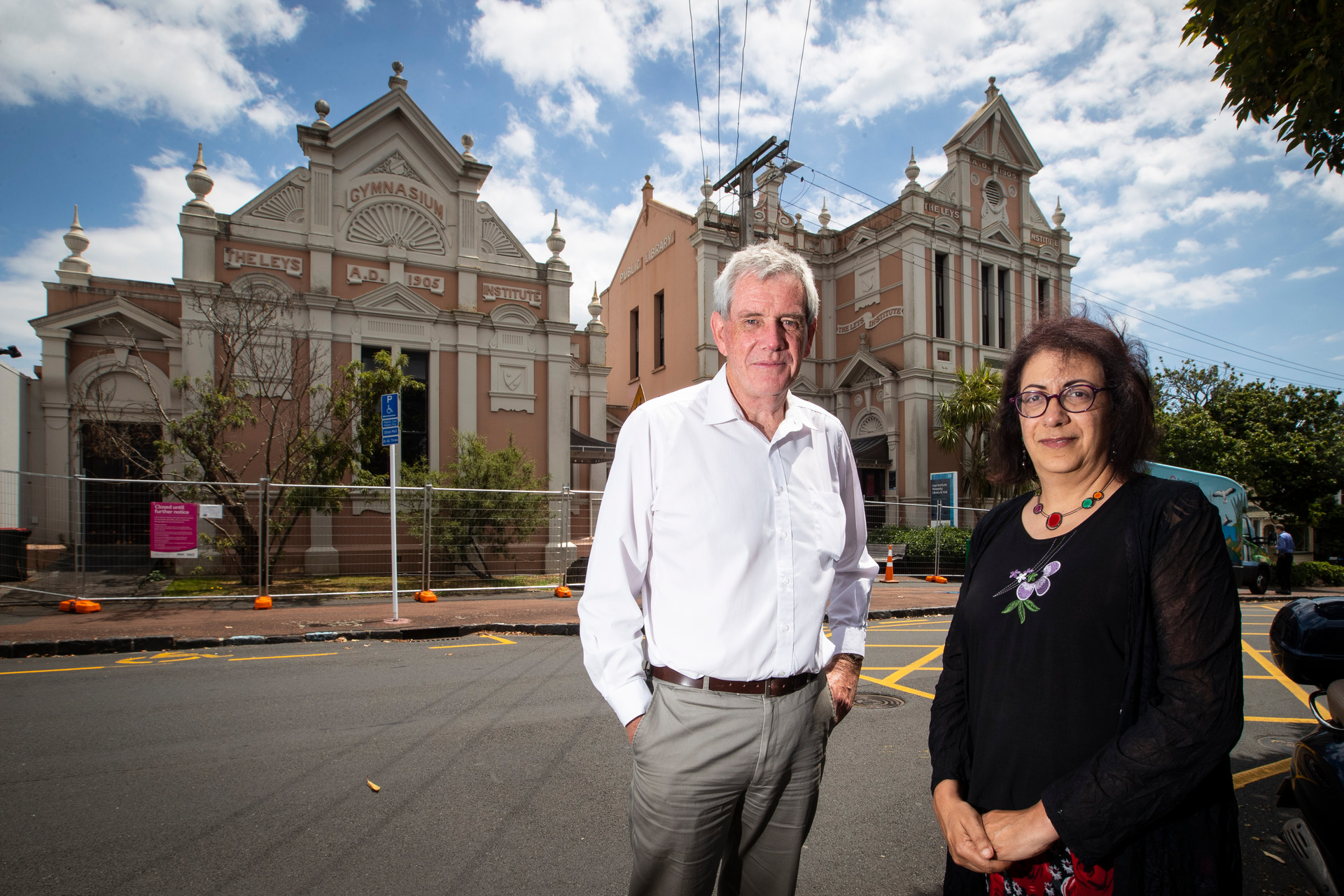Customer and community services director Ian Maxwell, left, and council chief engineer Sarah Sinclair outside the closed Leys Institute in St Marys Bay. Photo / NZ Herald