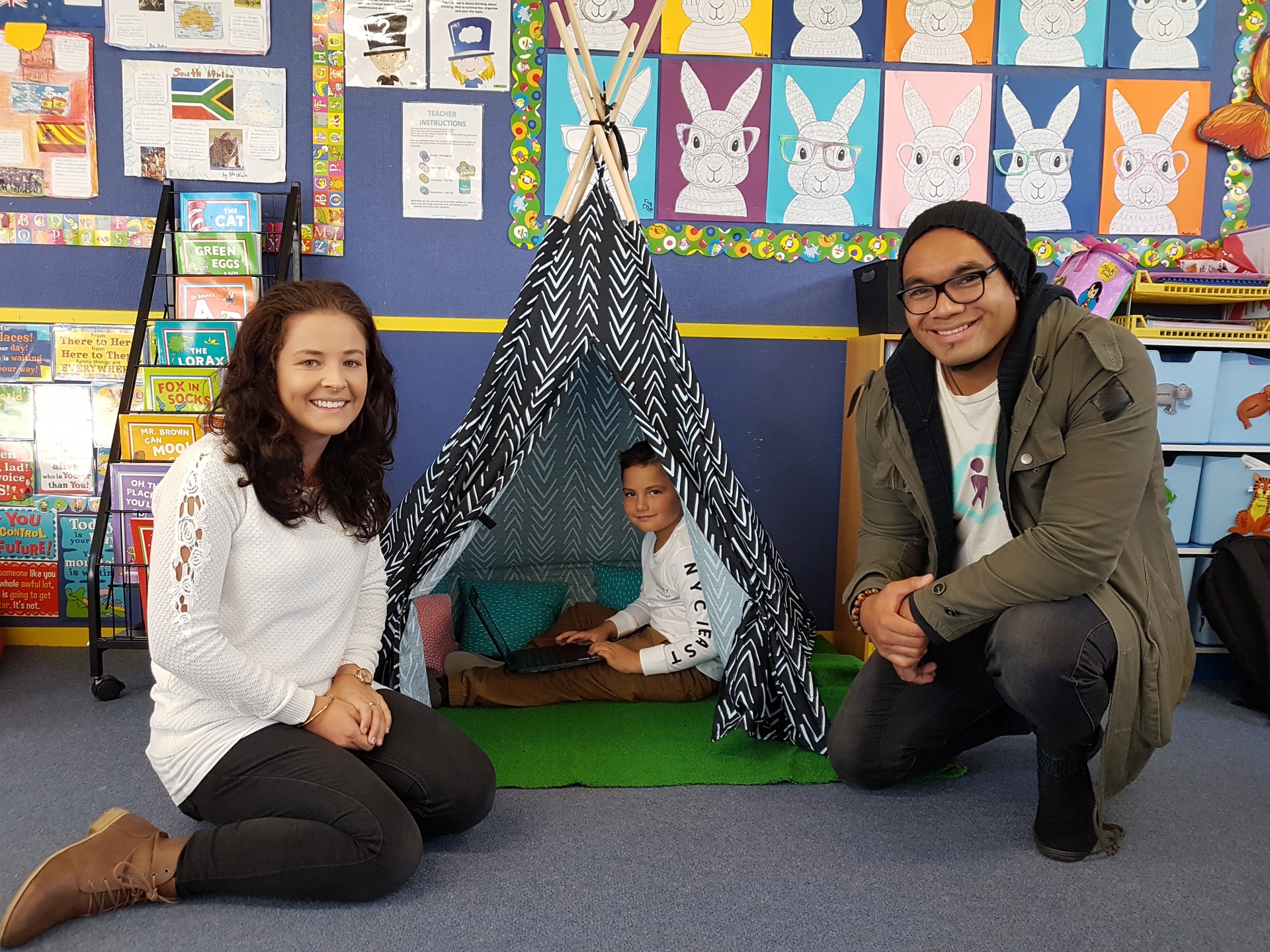 Massōne Tutauha, pictured with his mum Bex (left) and Pembroke School's Junior Togia, could retreat into a tent in his classroom when he felt a meltdown coming on. Photo / Ilona Hanne, Stratford Press