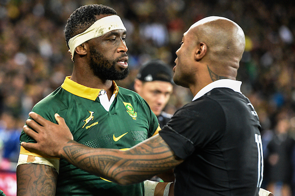 South African captain Siya Kolisi (left) speaks with Mark Tele'a after after the second test in Cape Town. Photo / Photosport