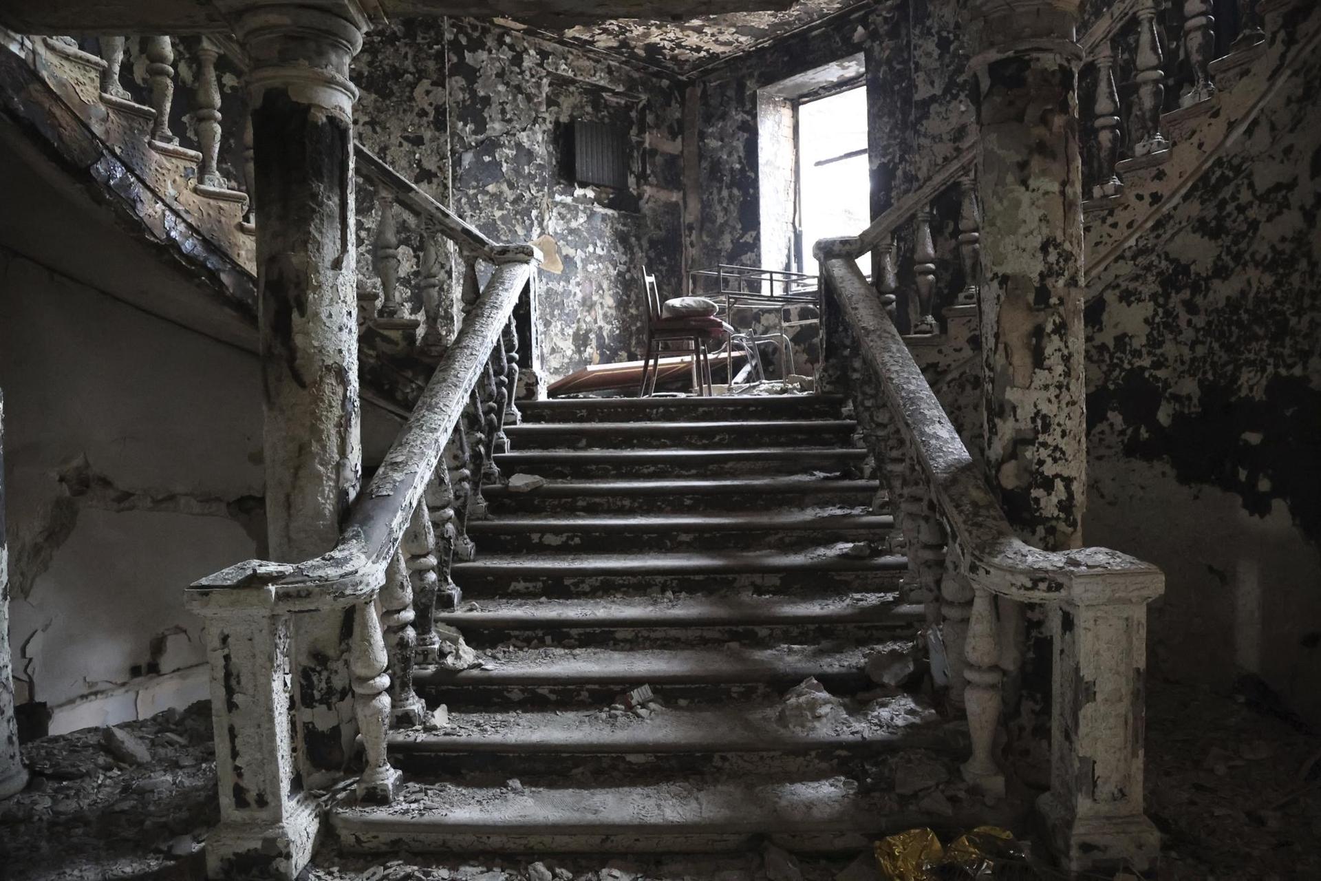 Debris covers the inside of the Donetsk Academic Regional Drama Theatre following a March 16, 2022, bombing in Mariupol. Photo / AP
