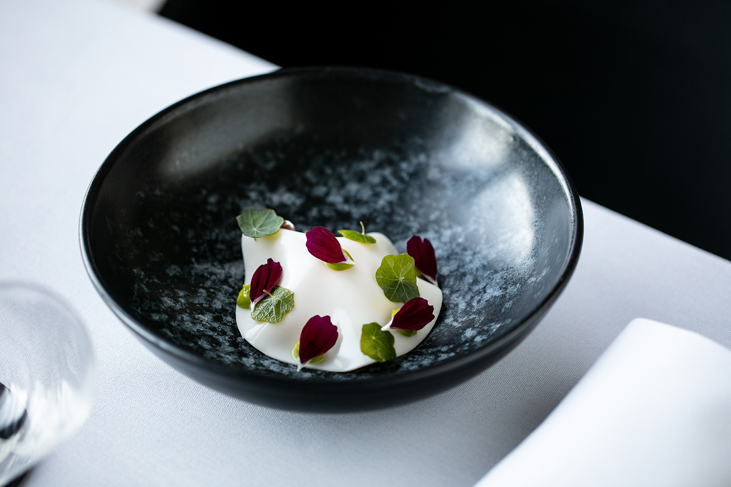 The kingfish, with yuzu, chilli and coconut. Photo / Babiche Martens