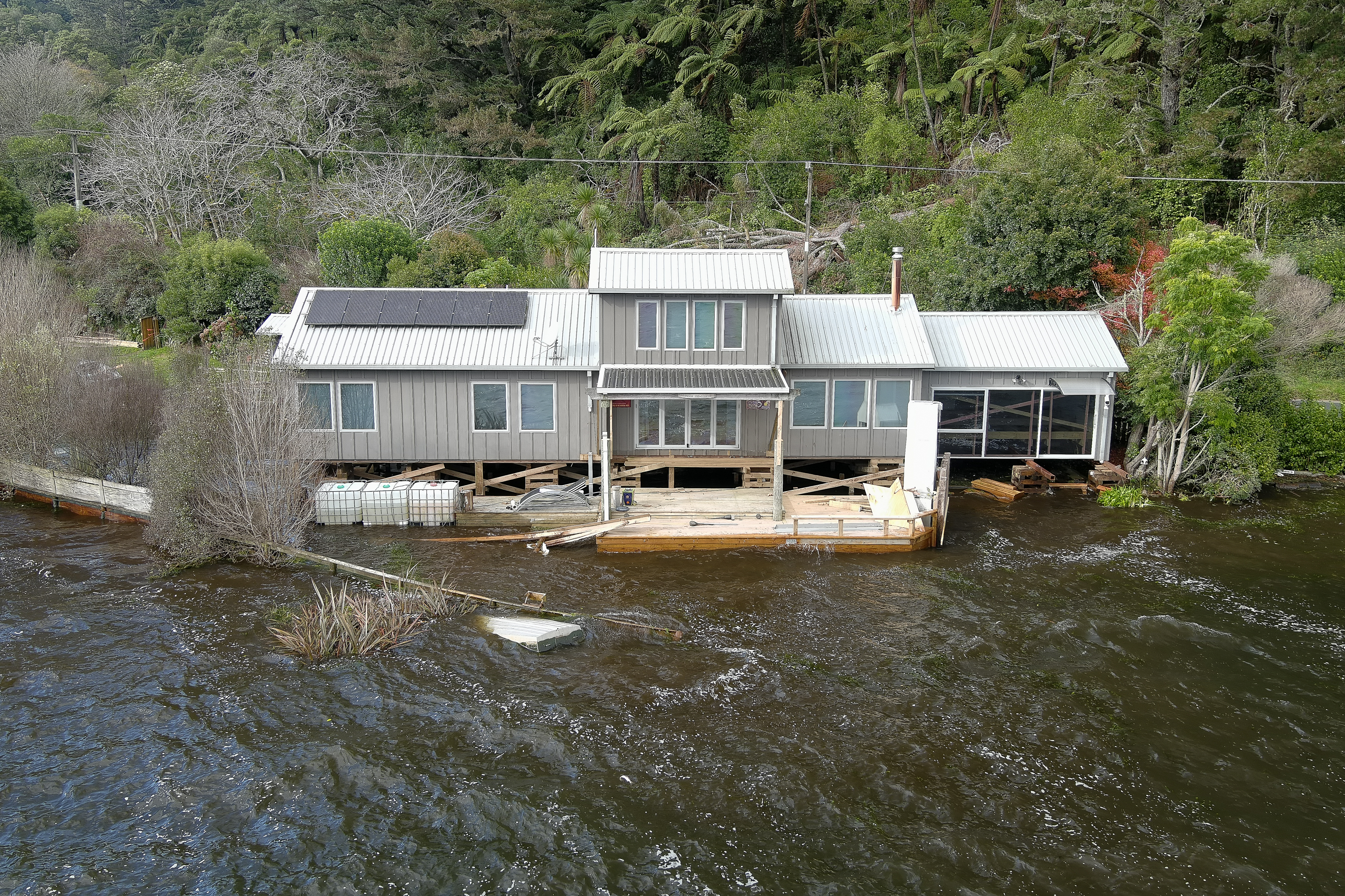 Rotoehu lake level has risen to a point where lakeshore homes are being flooded. Photo / Andrew Warner