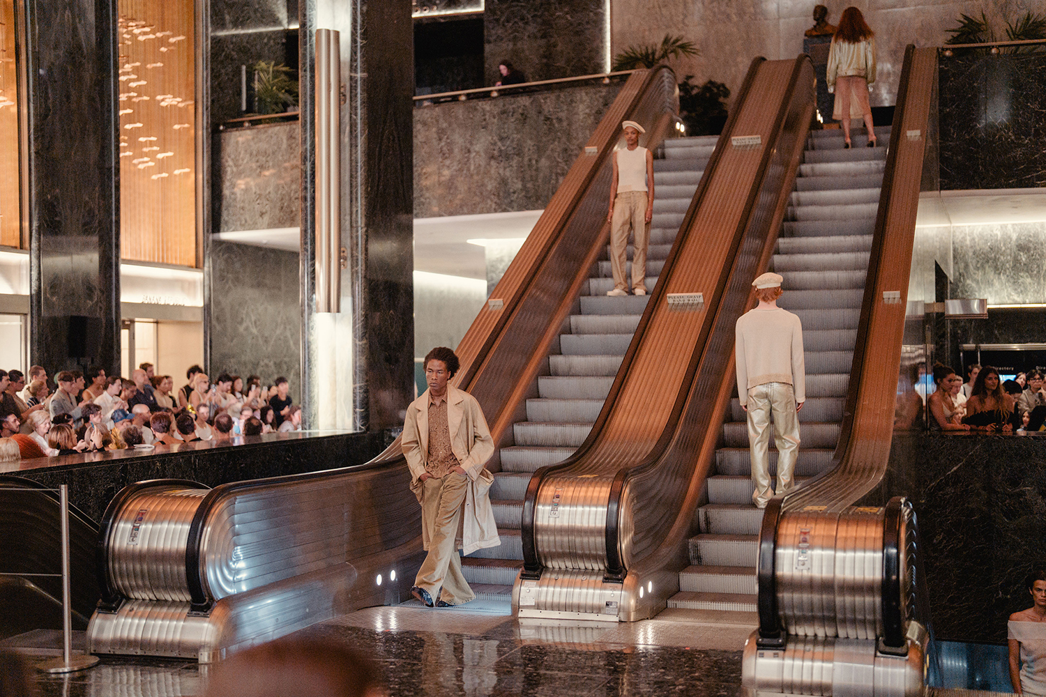 At the Eckhaus Latta spring 2024 fashion show, models ride up and down the escalators at Rockefeller Center in New York. Photo / Amir Hamja, The New York Times