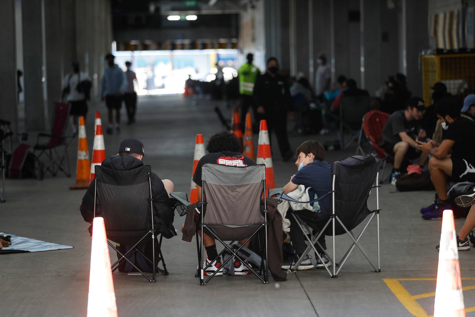Yesterday people camped outside Sylvia Park shopping mall waiting for shops to open today as Auckland moves to Covid-19 alert level 3.2. Photo / Dean Purcell