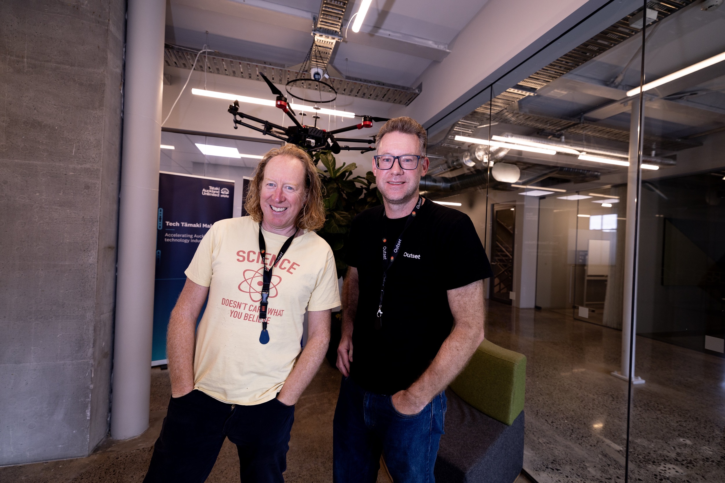 Sean Simpson and Mat Rowe at Outset Ventures' Balfour Rd building, with a Dotterel drone that has a Kono directional boom mic attached. Photo / Dean Purcell