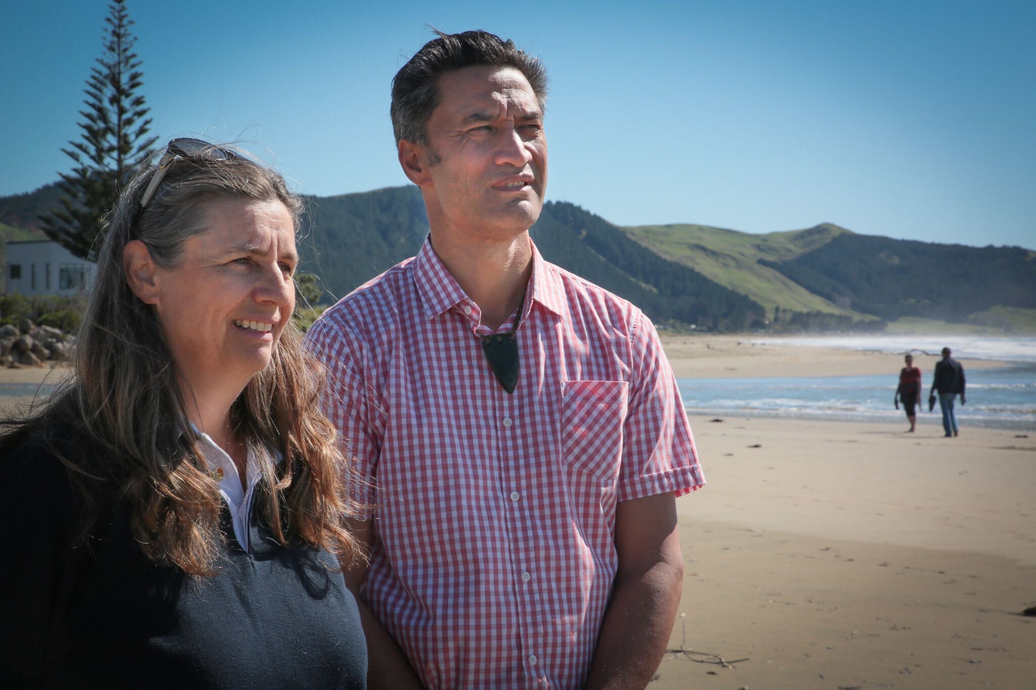 Sophie Siers (left) at Waimarama Beach with Ngāti Kahungunu iwi chairman Bayden Barber at Waimarama Beach.