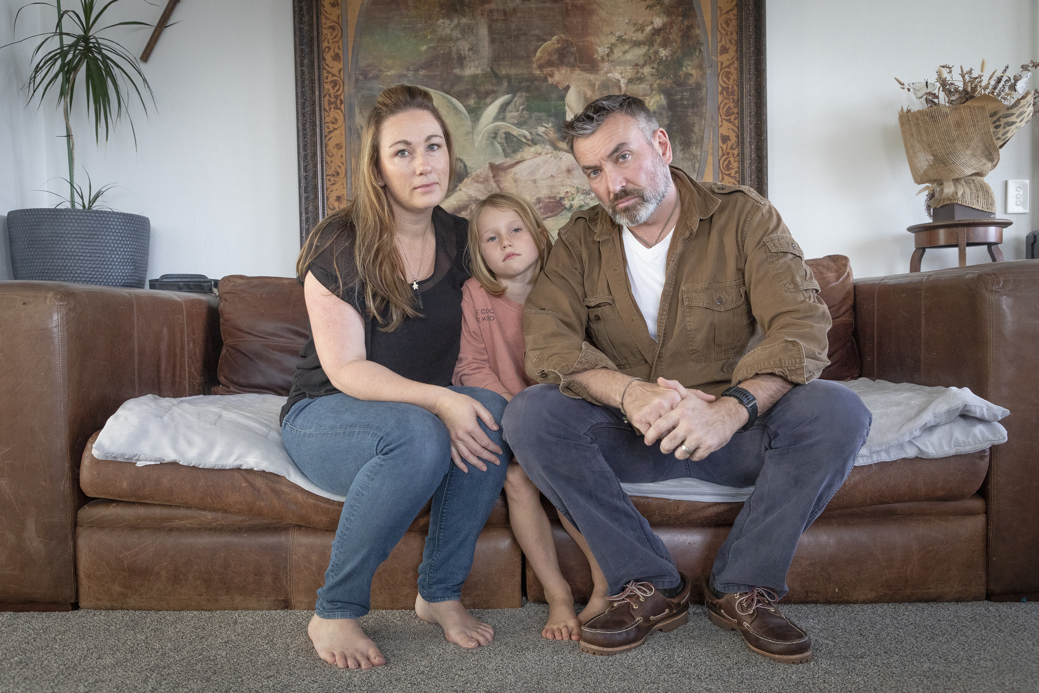 Sienna Lewis, 6, with her parents, Krystie and James Lewis. Photo / Andrew Warner