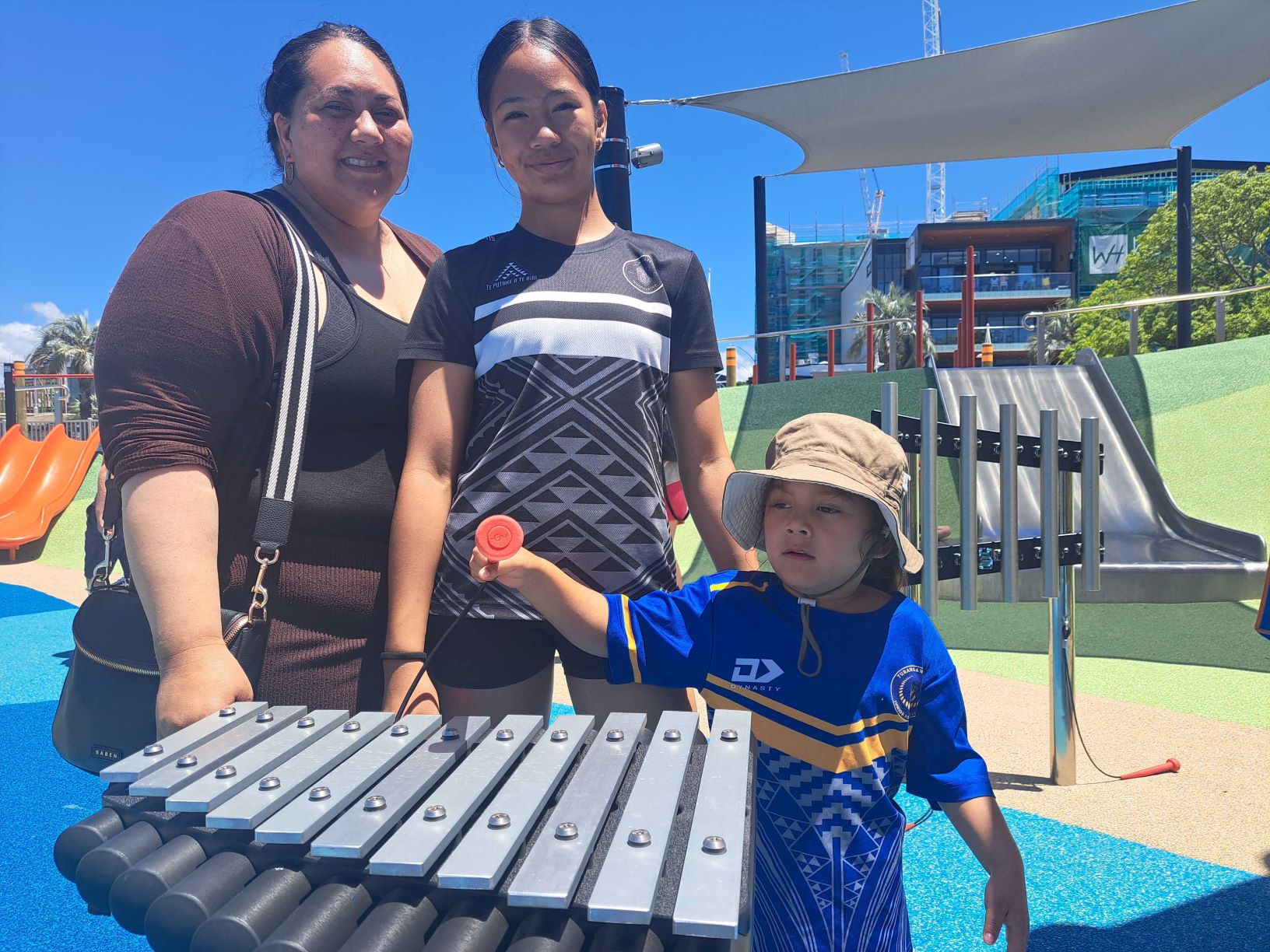 Panekuhukuhu Muru, 37, her daughter Ale'a Muru, 14, and her nephew Te Whati Rau, 4, all from Hamilton visiting the new Tauranga destination waterfront playground. Photo / Sandra Conchie