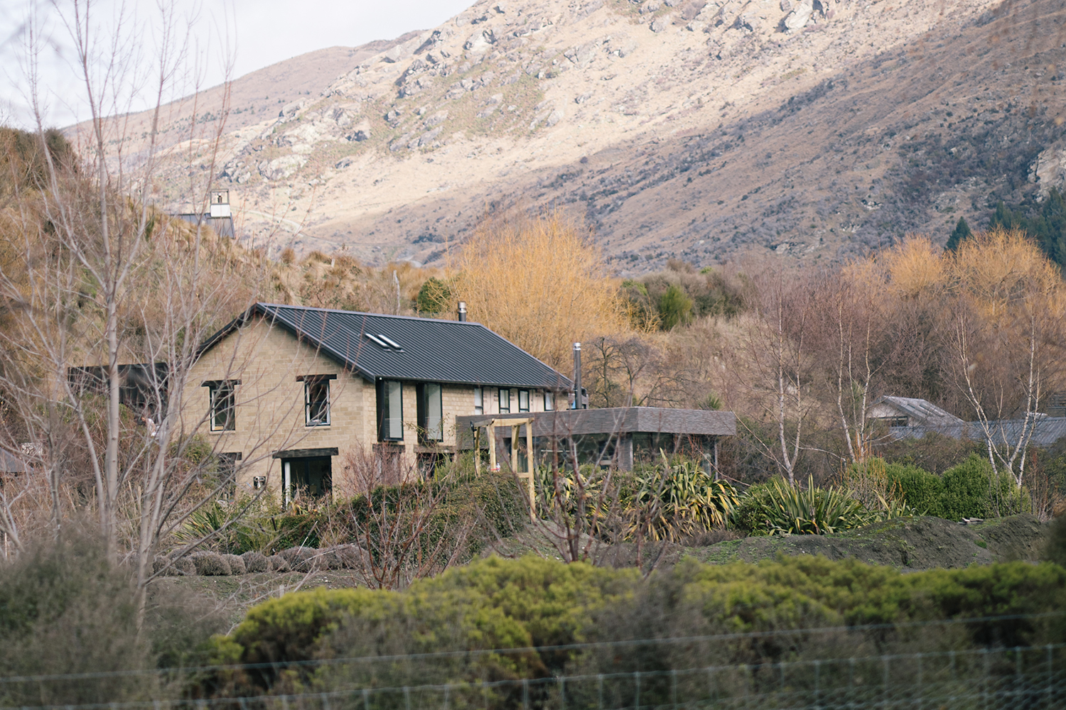 Her new home takes in sweeping views of Queenstown's alpine landscape. Photo / Dawn Thomson
