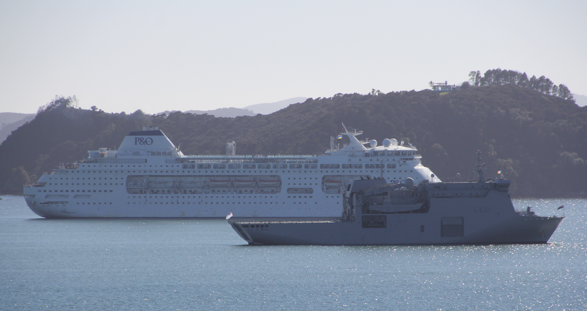 Navy support vessel Canterbury passes the P&O liner Pacific Pearl. Photo / NZME