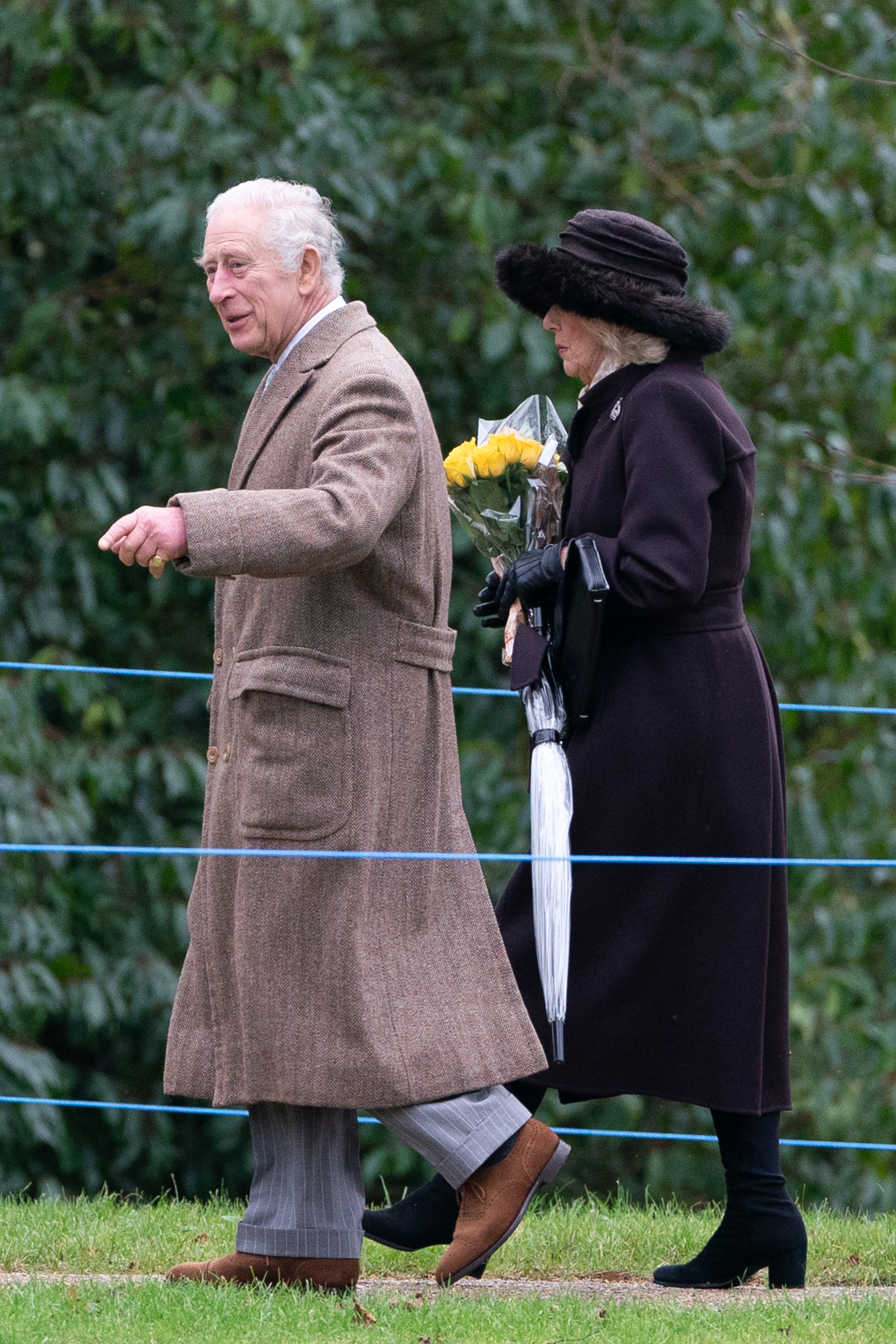 The King and Queen arriving for a Christmas Eve church service at Sandringham. Photo / Getty Images