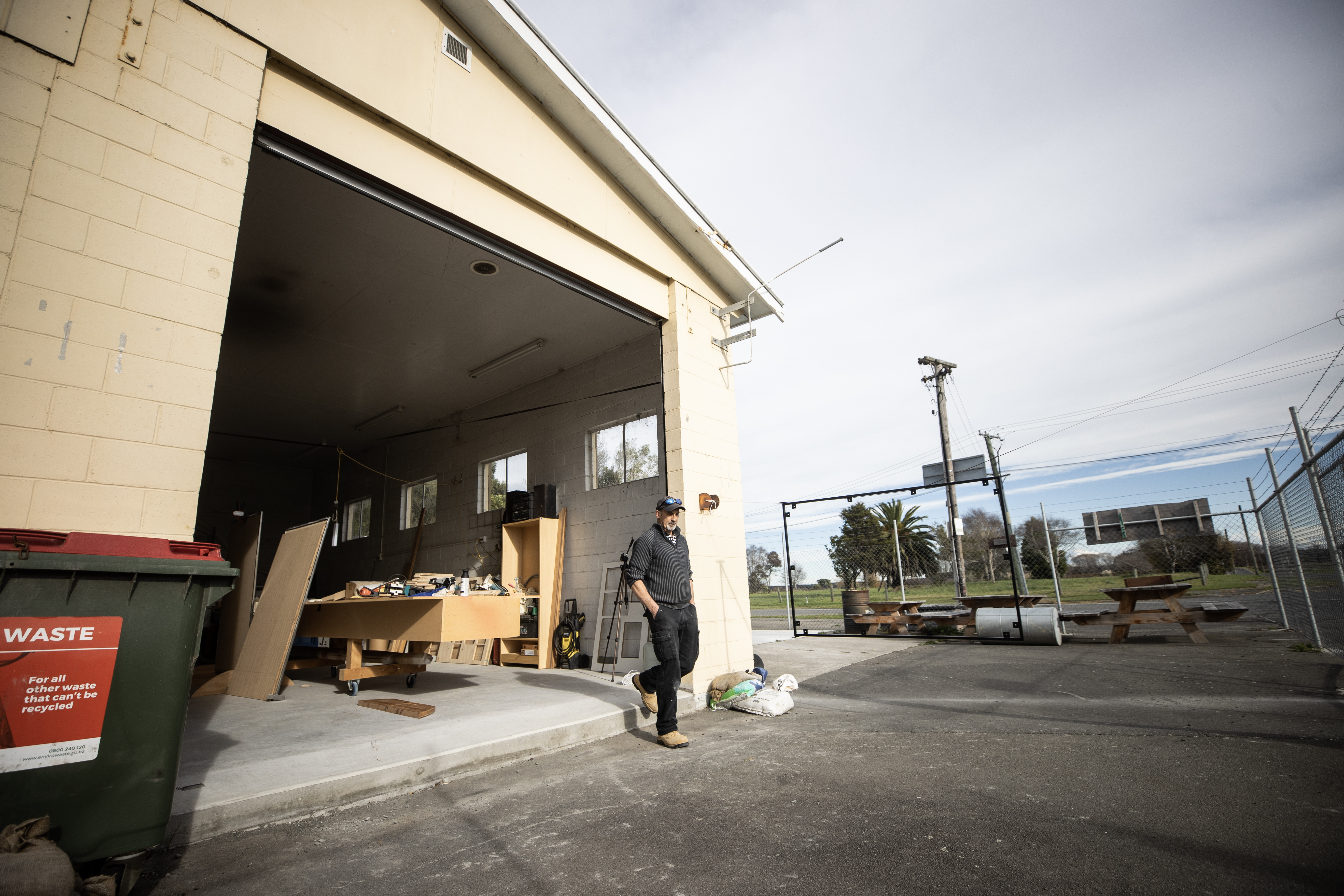 Geoff Slater moved into the old Brooklands fire station two years ago, one of the few incomers since the quakes. Photo / George Heard