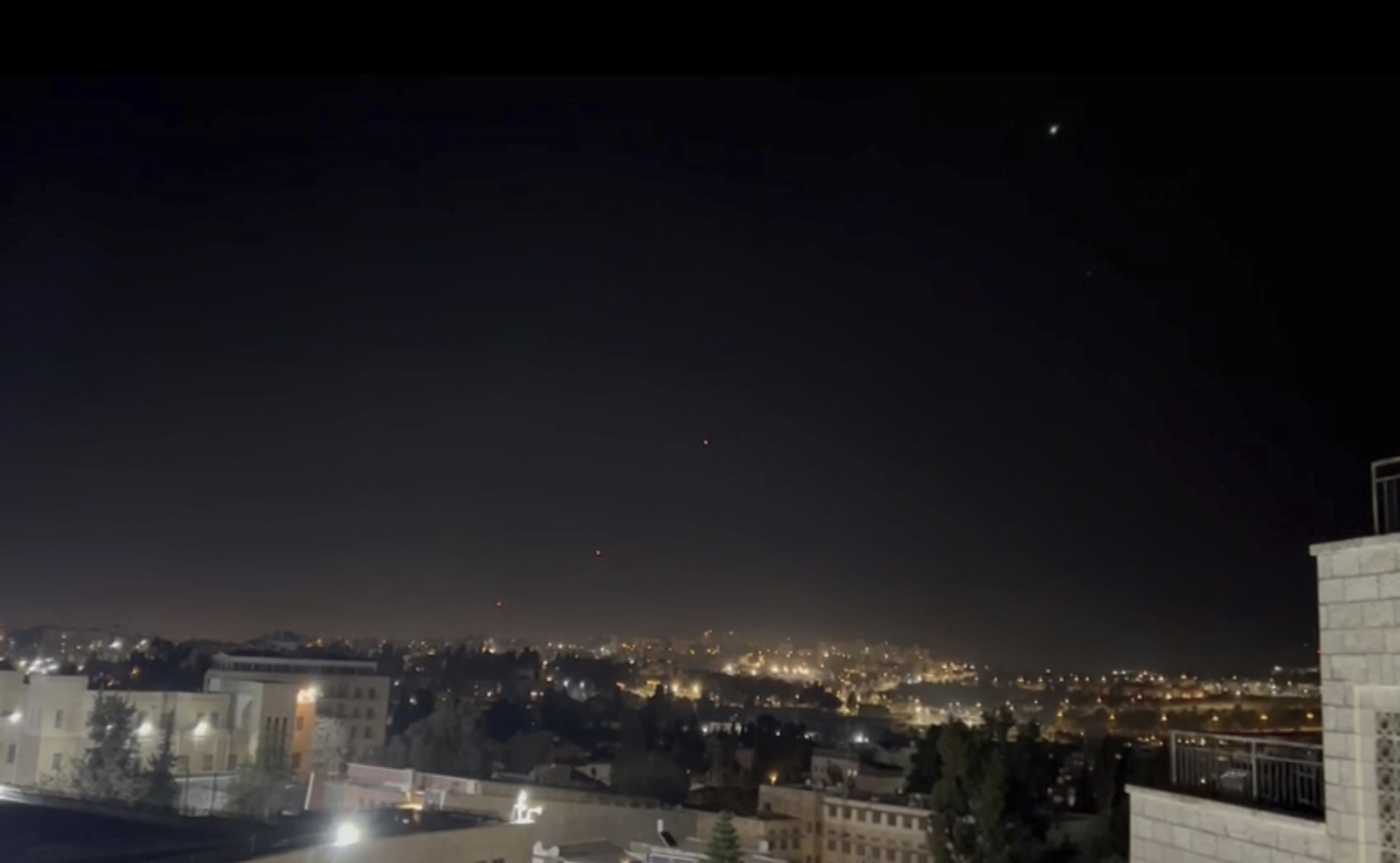 Interceptors missiles are launched into the sky early on Sunday in Jerusalem. Photo / AP