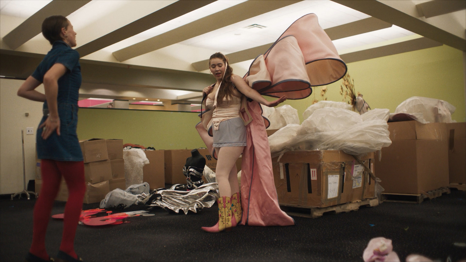 An image from ‘The Victoria’s Secret World Tour’ shows Michaela Staark exploring the Victoria’s Secret archives with a colleague. Photo / Margot Bowman, Victoria's Secret via The New York Times