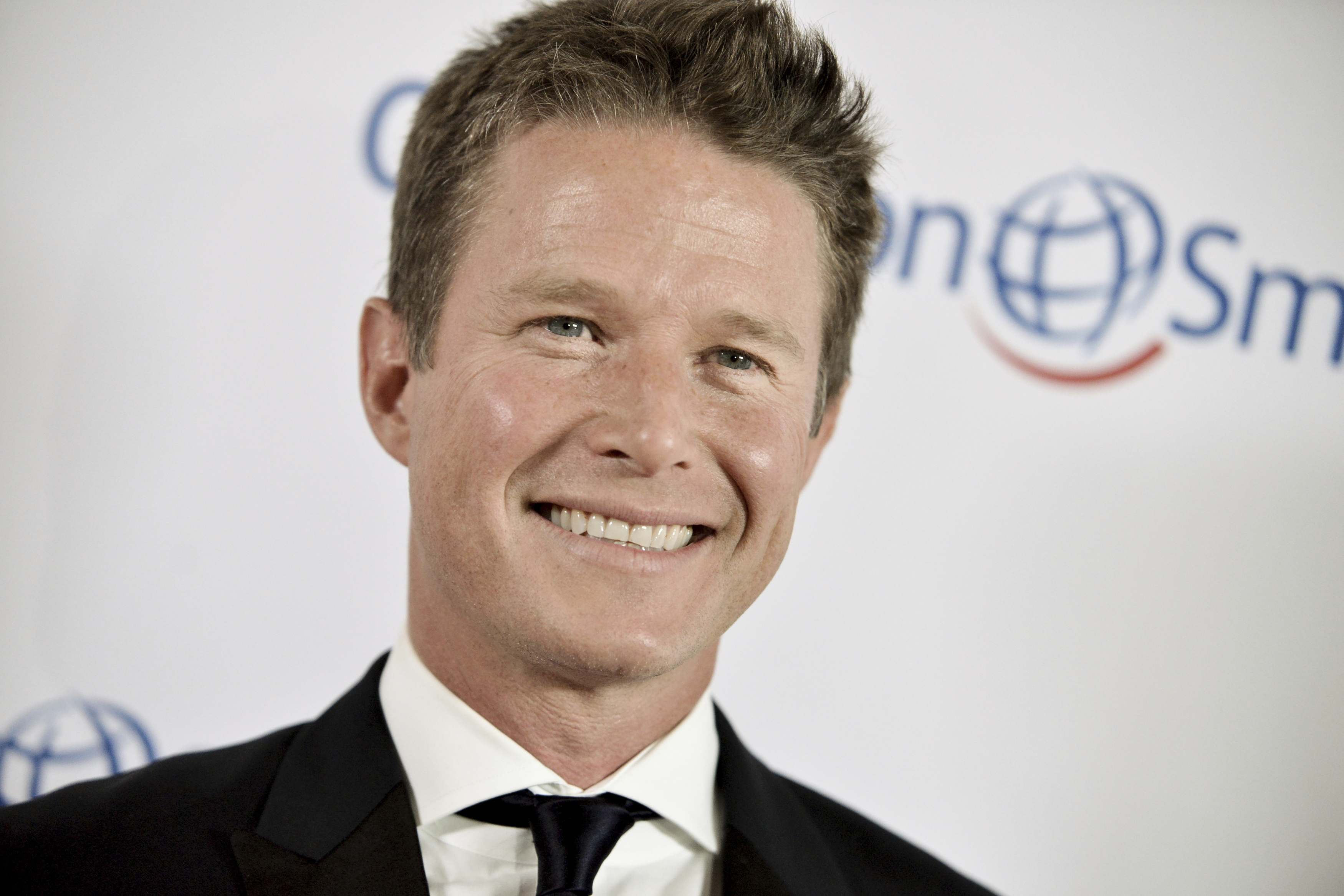 Former Access Hollywood host Billy Bush says he wished he'd changed the topic. Photo / AP