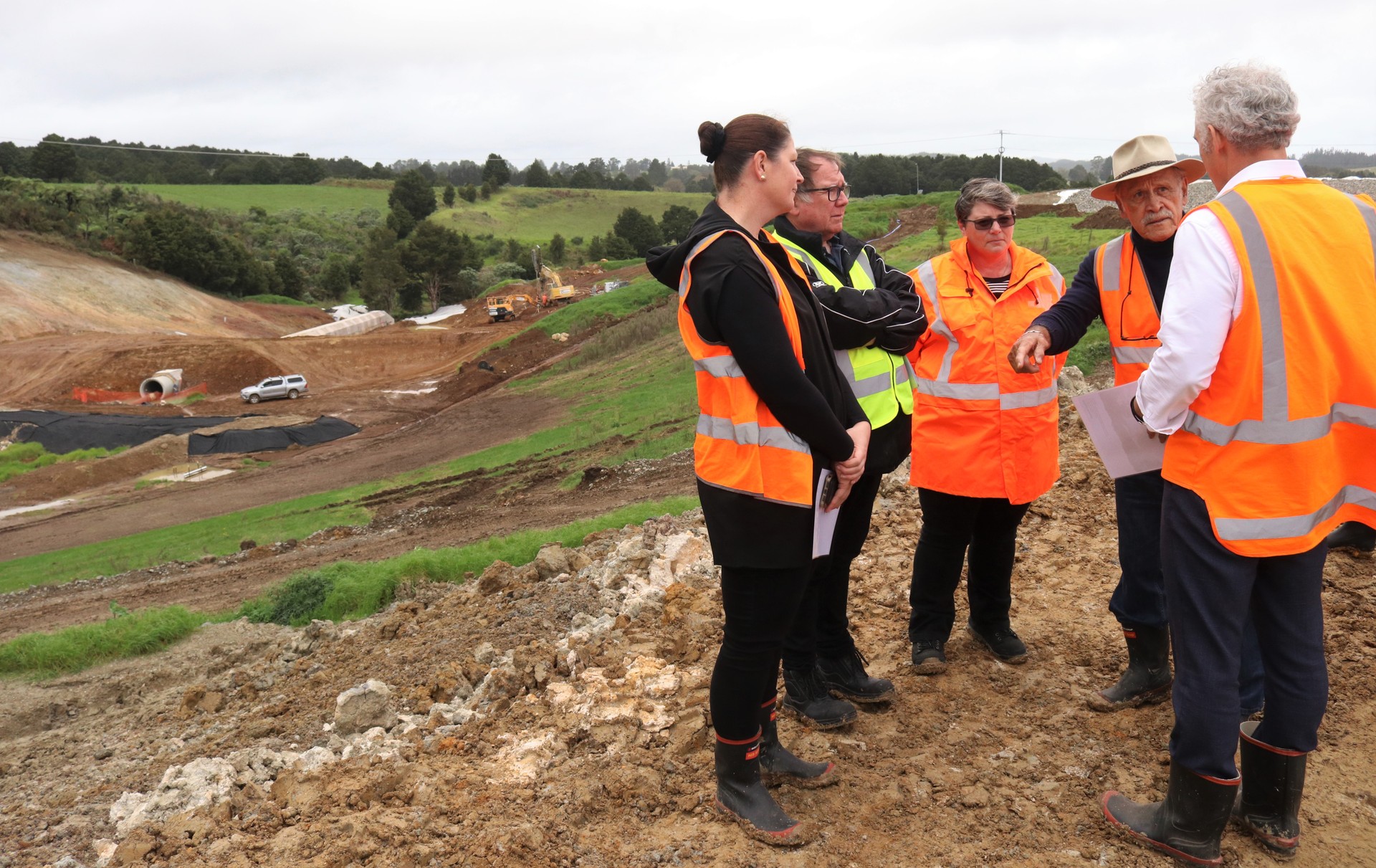Discussing the dam taking shape on the left of the photo are, from left, Northland MP Willow-Jean Prime, Te Tai Tokerau Water chairman Murray McCully, trustees Kathryn de Bruin and Dover Samuels, and Regional Economic Development Minister Stuart Nash. Photo / Peter de Graaf