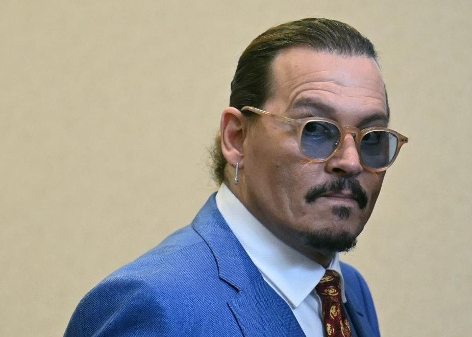 Johnny Depp may not collect his multi-million dollar payout from his ex-wife Amber Heard. Photo / AP