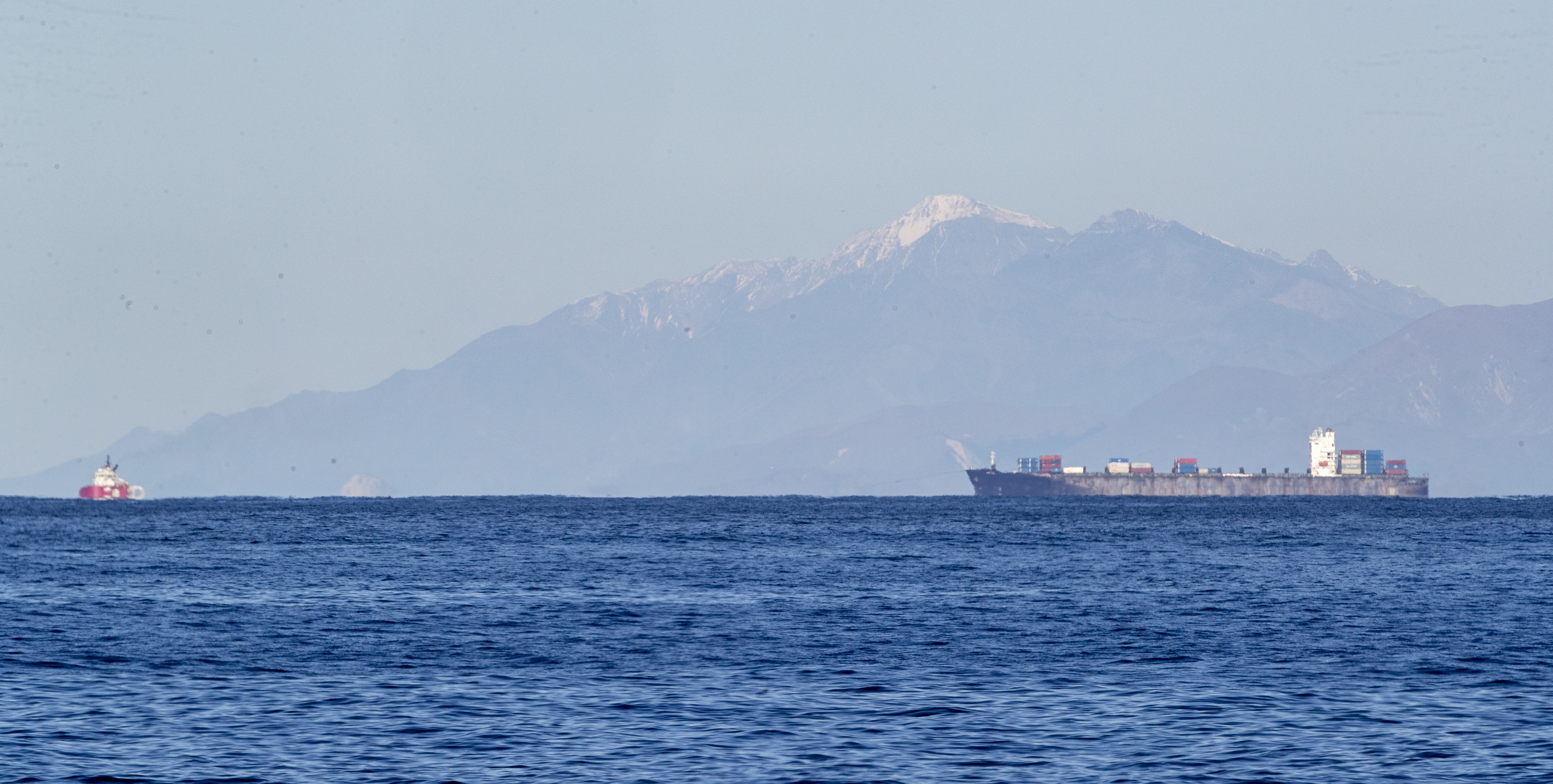 The container ship MV Shiling under tow in Cook Strait, near the entrance to Wellington Harbour. Photo / Mark Mitchell