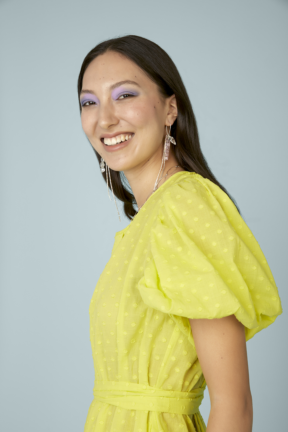 Add a playful dose of maximalism to your look with a pair of statement earrings. Photo / Babiche Martens