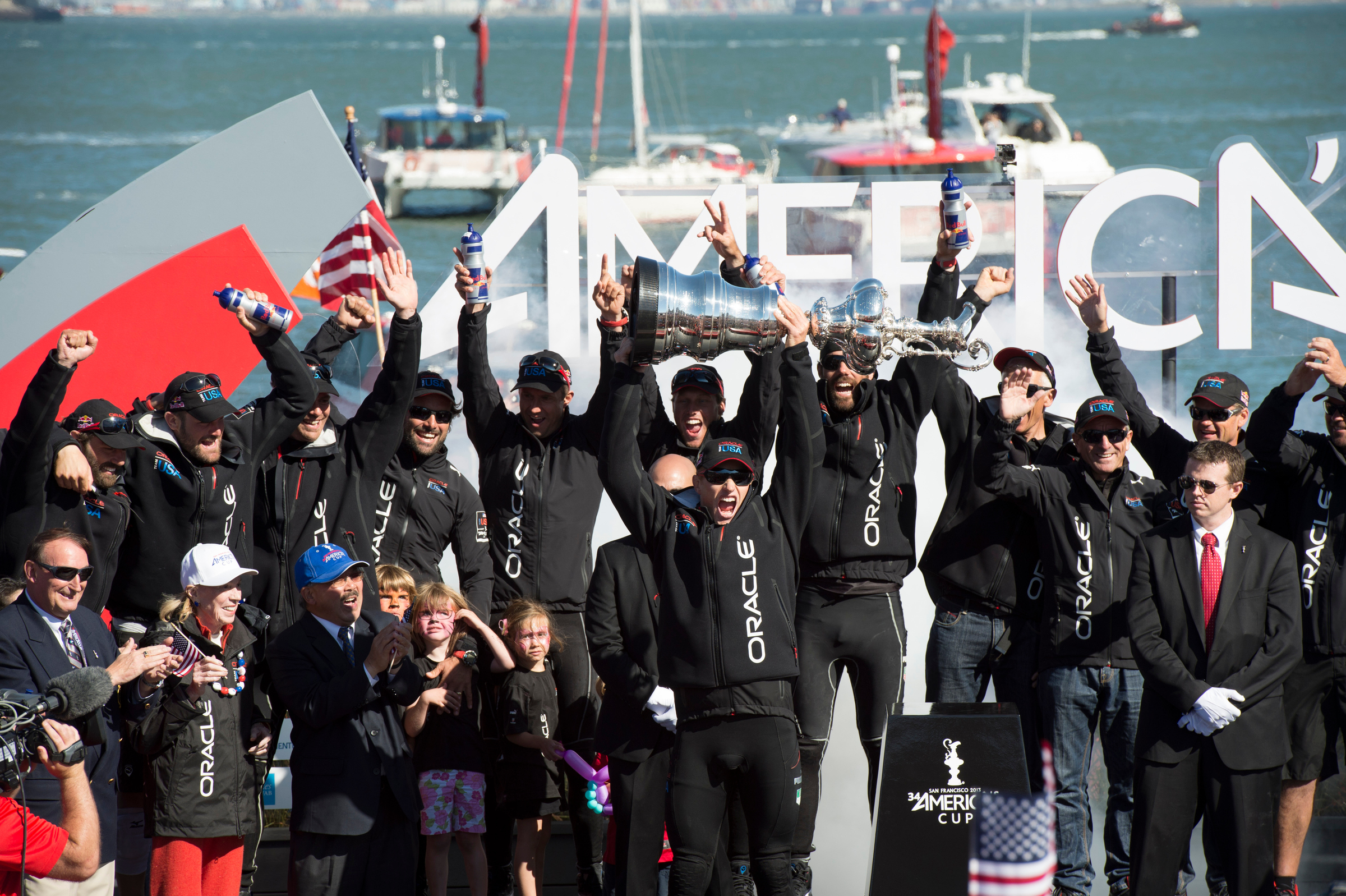 Jimmy Spithill holds the America's Cup aloft after Oracle Team USA's successful defence against Emirates Team New Zealand in 2013. Photo / Chirs Cameron, Photosport