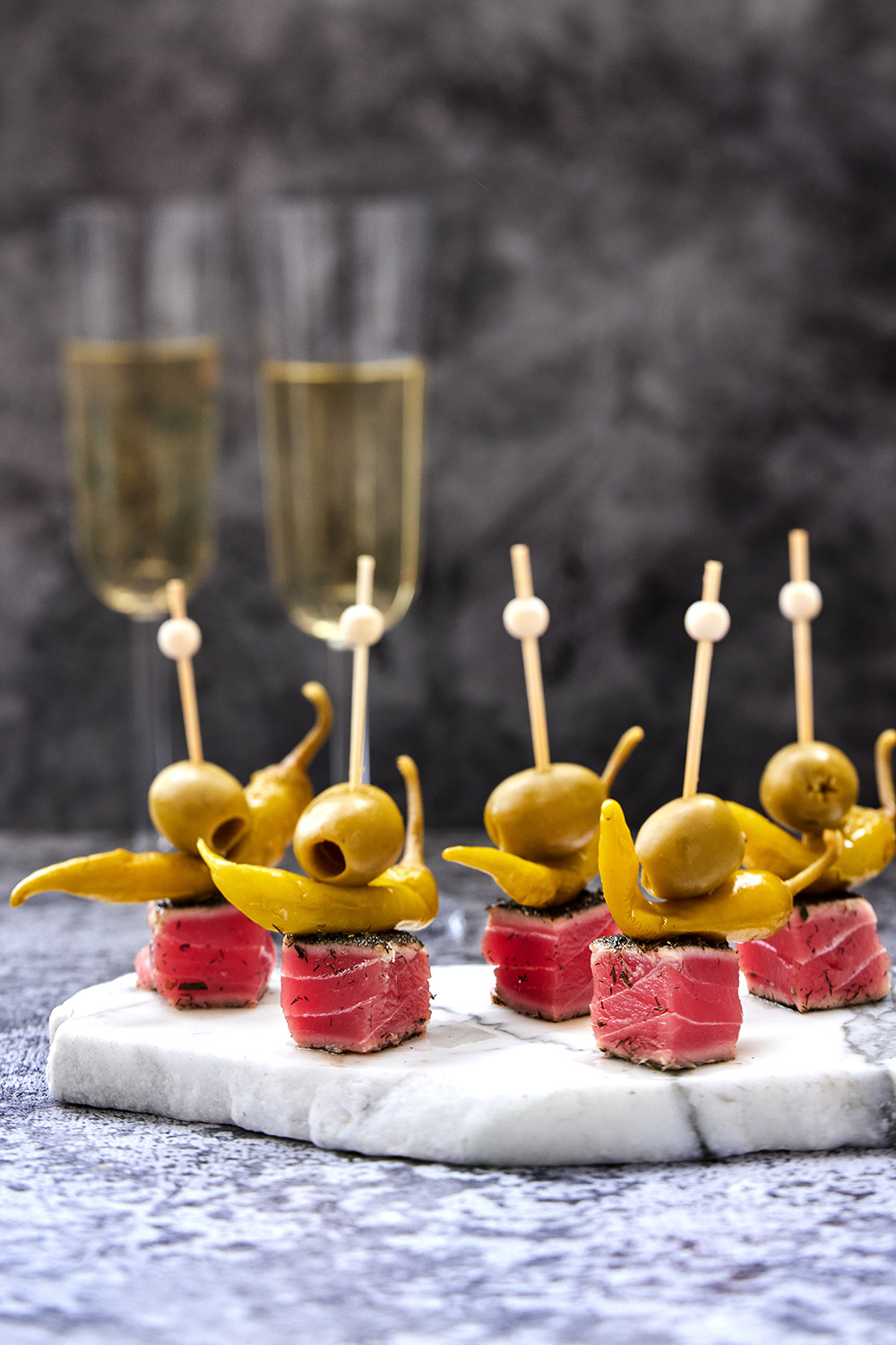 These salty tuna skewers are perfect for welcoming guests to a party. Photo / Babiche Martens