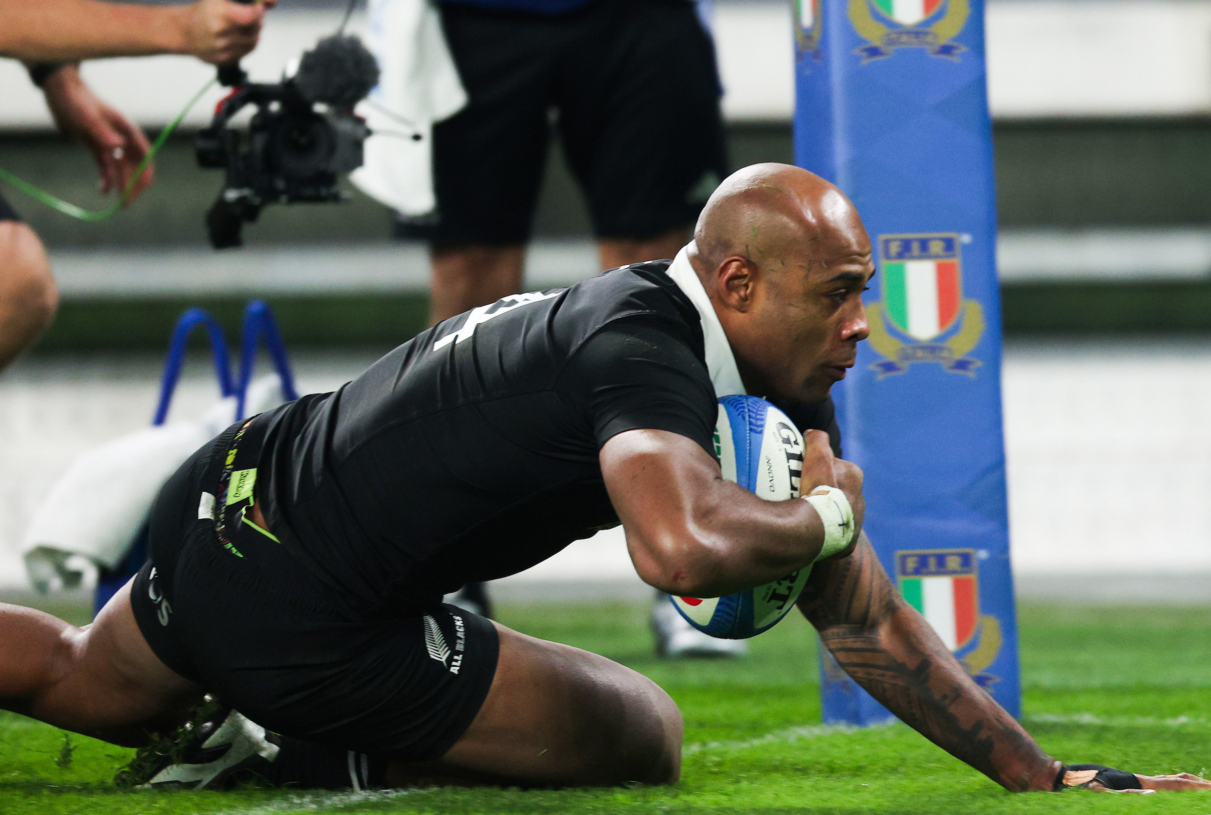 Mark Tele’a dots down to score the All Blacks' third try of the match. Photo / Photosport