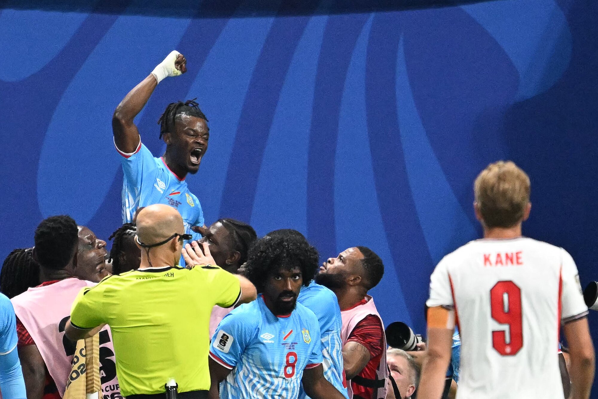 Congo DR's forward Brian Cipenga celebrates with teammates after scoring against England. Photo / AFP
