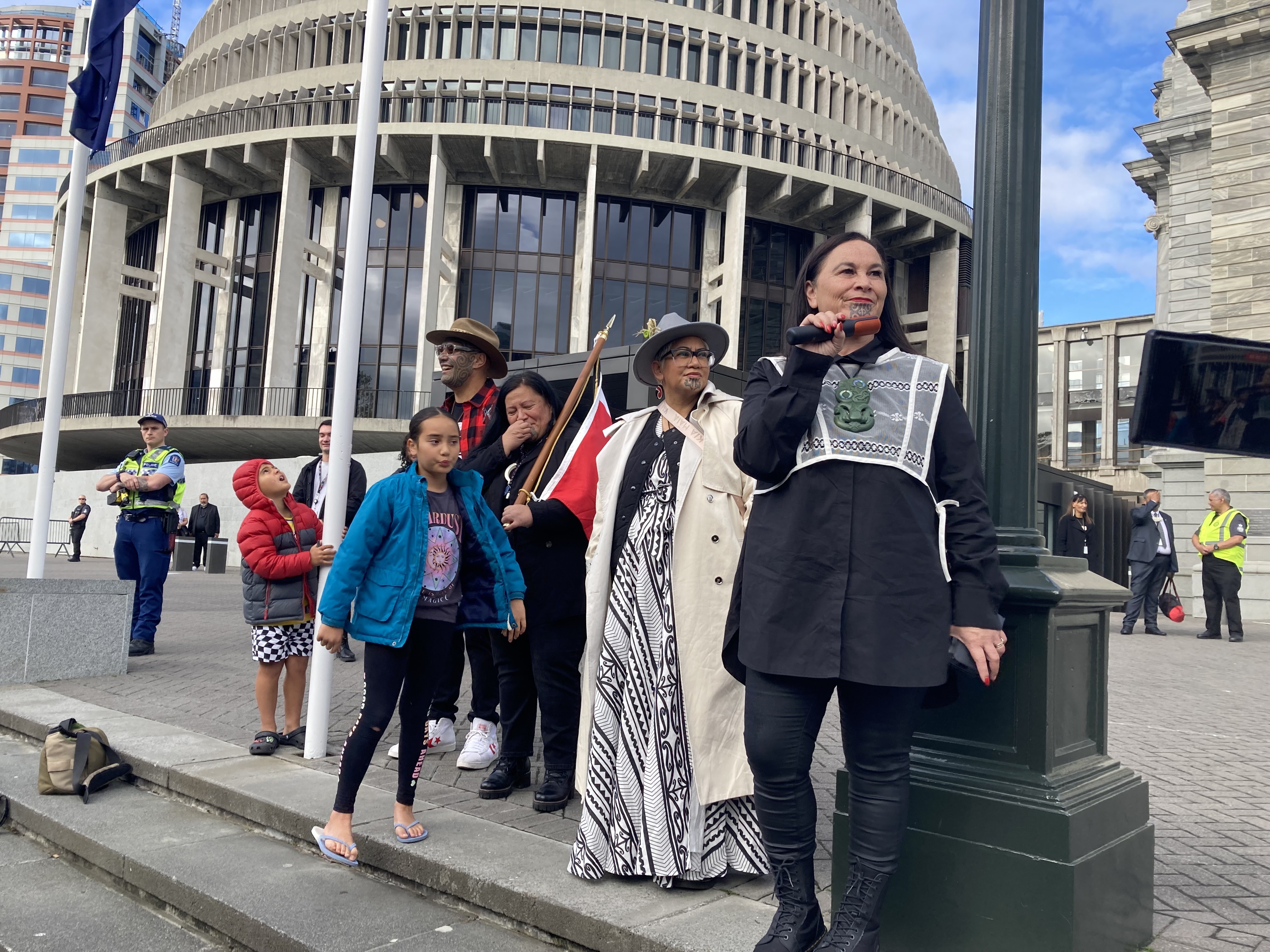 Te Pāti Māori co-leader Debbie Ngarewa Packer speaks outside Parliament during the protests.