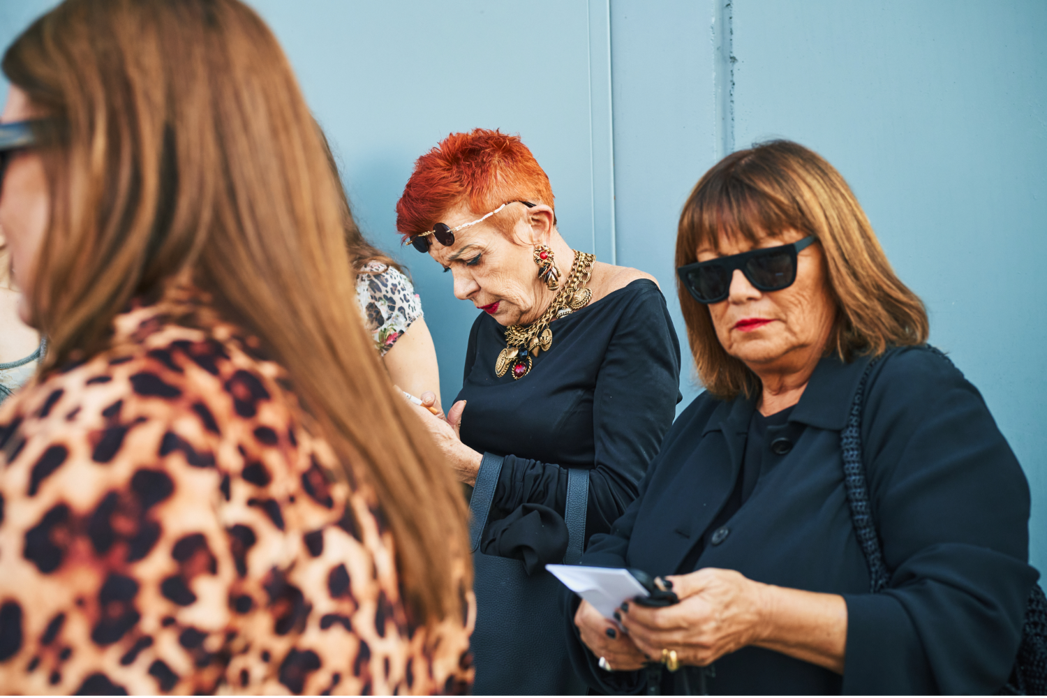 Fiery hair that lights up with each glint of the gold jewellery. Photo / Simbarashe Cha for The New York Times