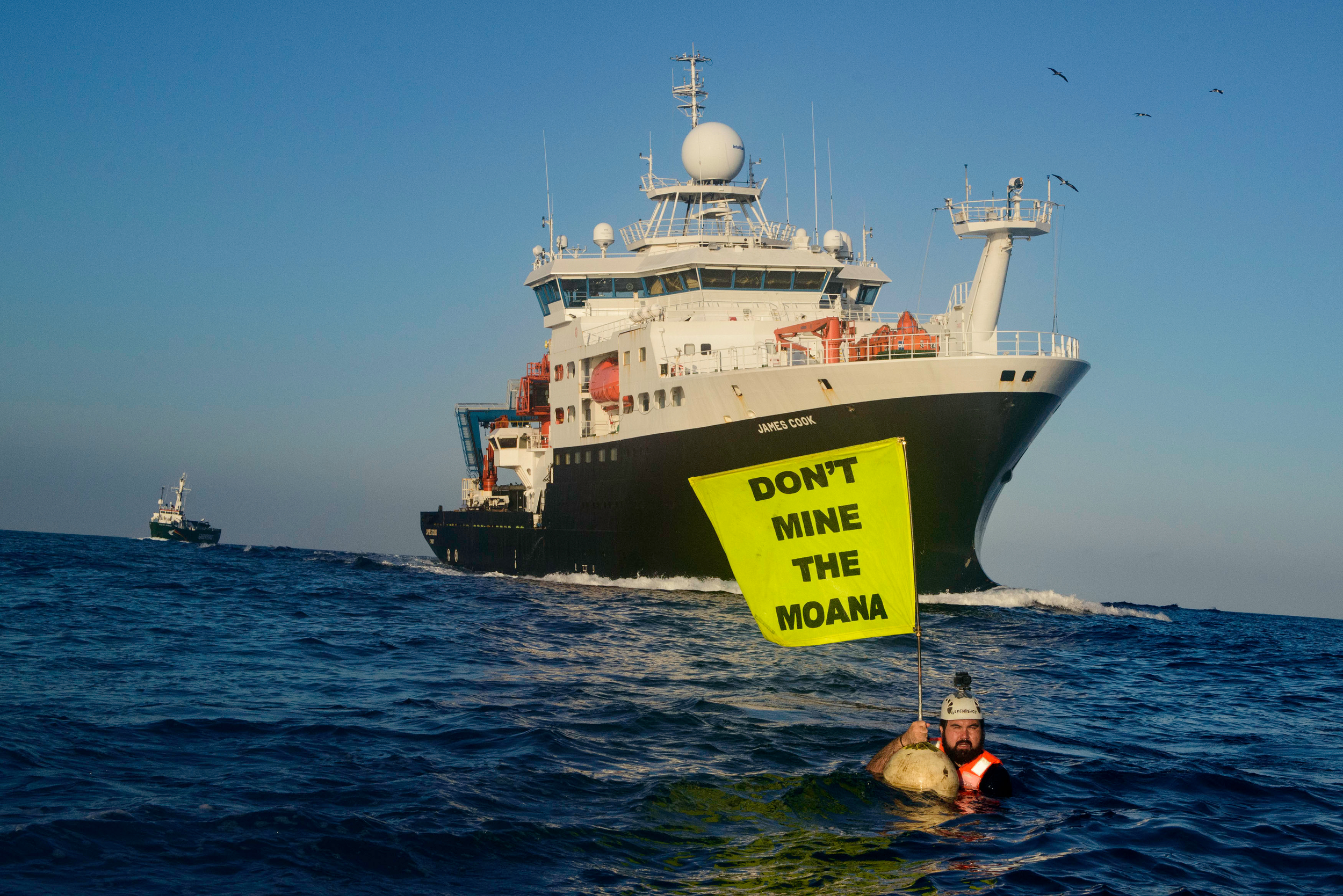 James Hita in the East Pacific Ocean protesting deep sea-mining as part of a Greenpeace Pacific delegation to the 28th Session of the International Seabed Authority. Photo / Martin Katz, Greenpeace