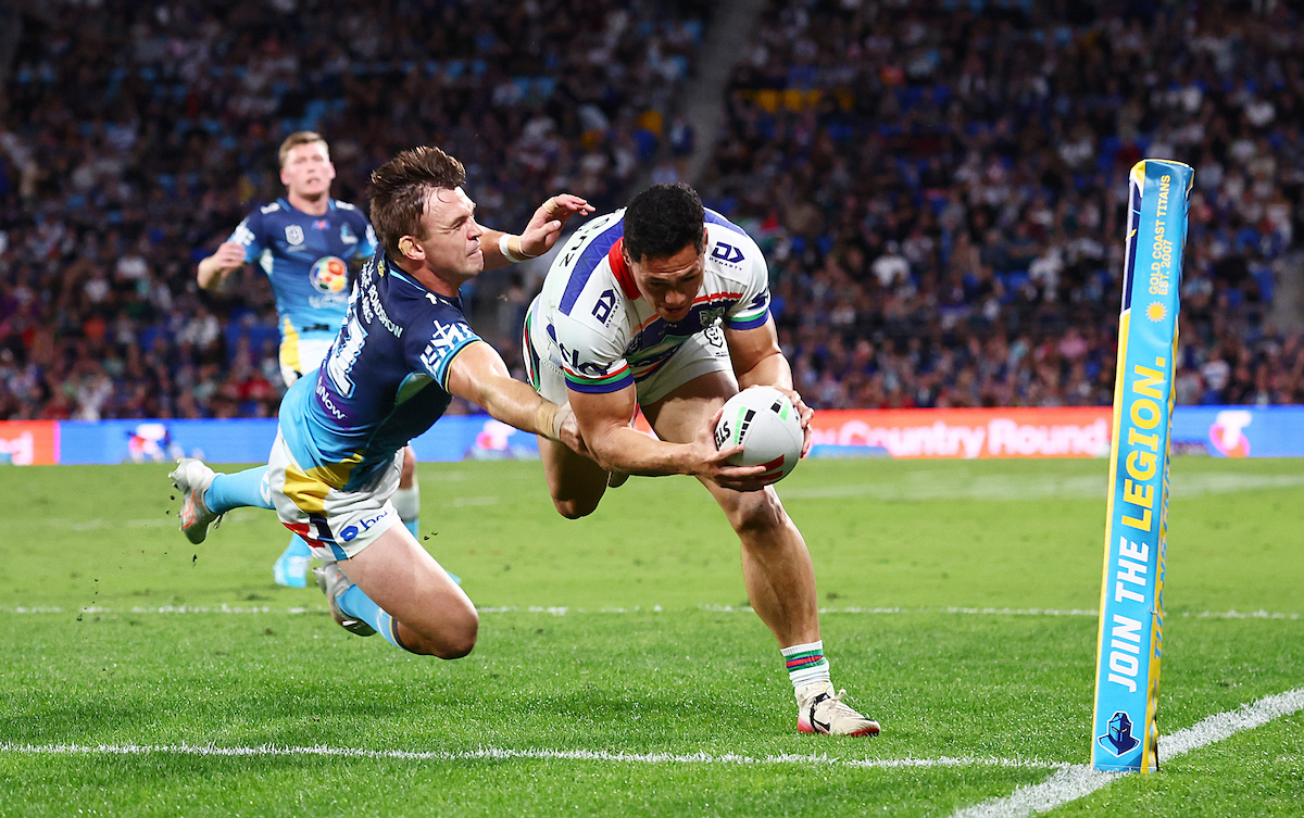 Roger Tuivasa-Sheck finds the tryline against the Titan=s. Photo / Photosport