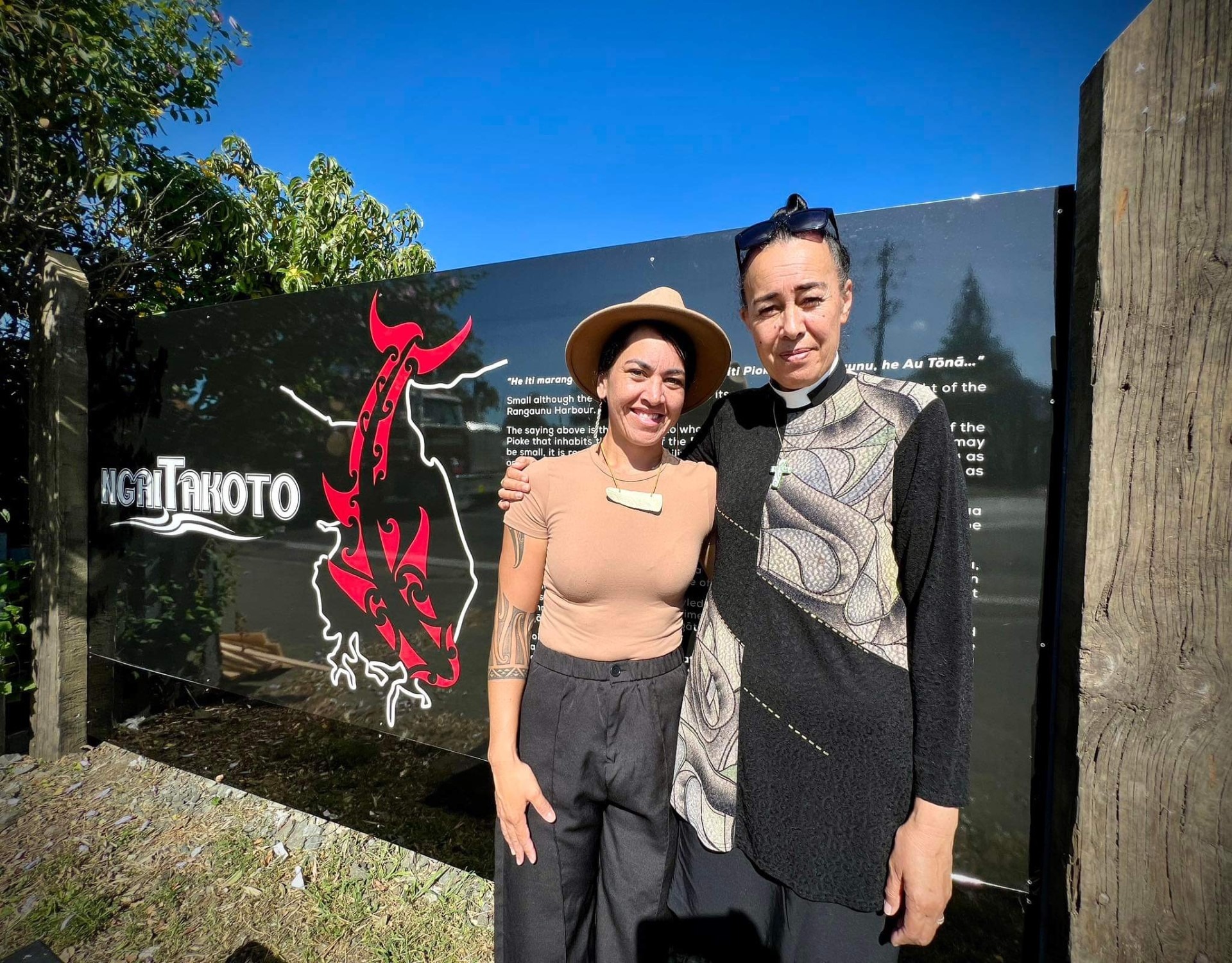 Awhi Marsden and Fran Hokianga, who did the blessing, at the new Awanui fence art facade that highlights sites of significance to Ngāi Takoto.