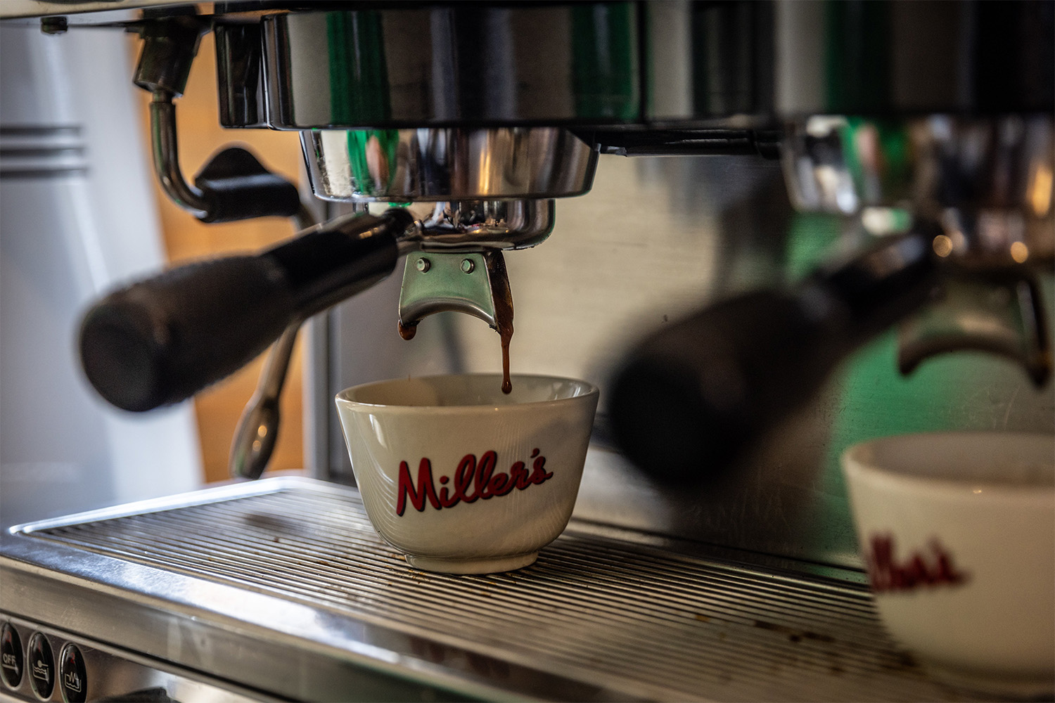 Victoria waits, while an espresso pours. Photo / Michael Craig