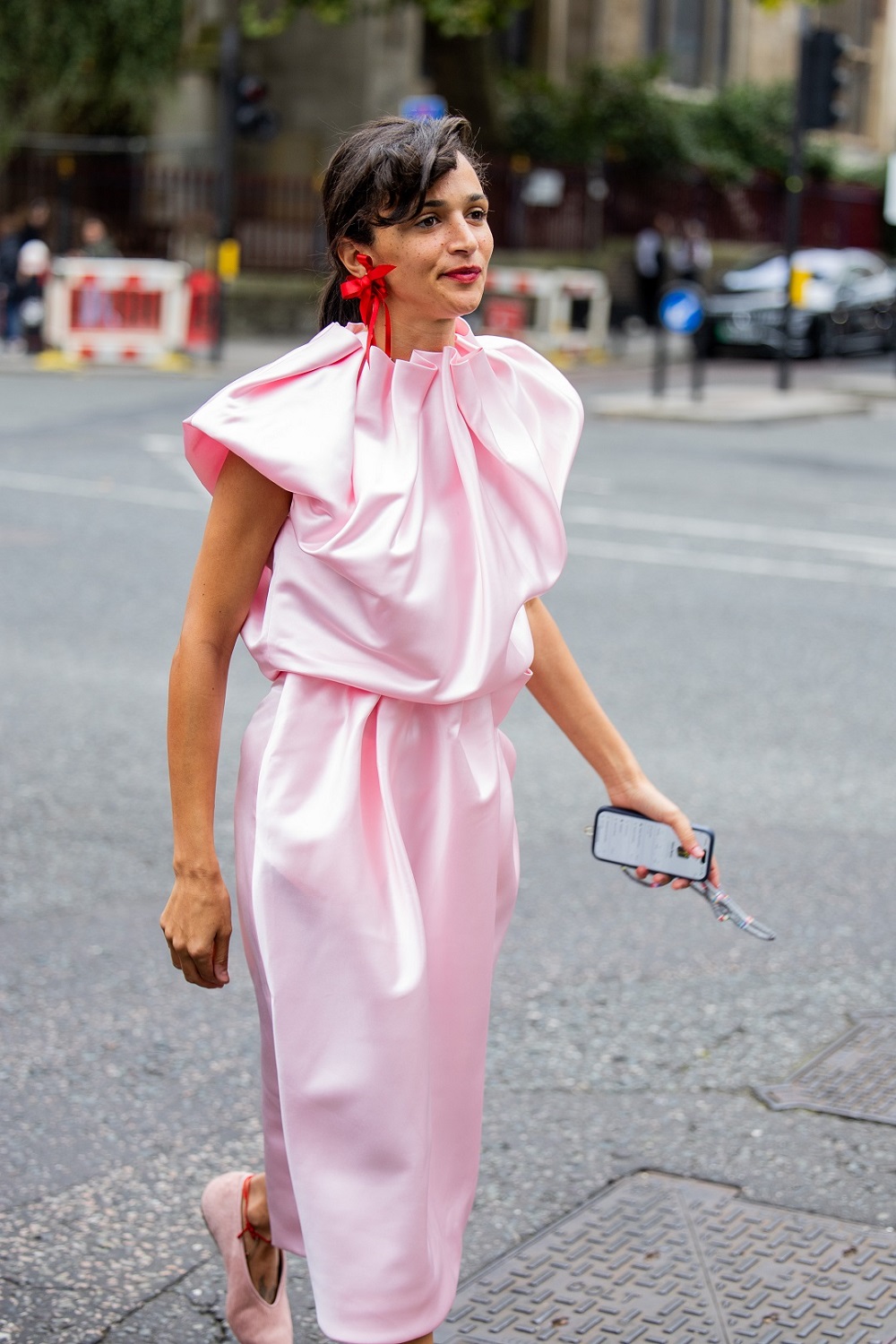 Laila Gohar wears pink and red to great effect at the Simone Rocha show at London Fashion Week. Photo / Getty Images